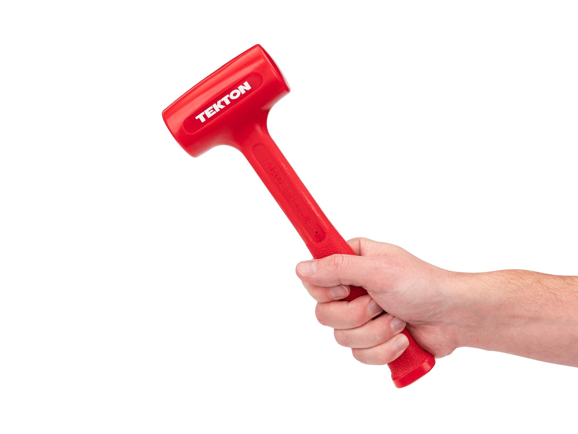 Person holding Tekton dead blow hammer. Item #HDB30021