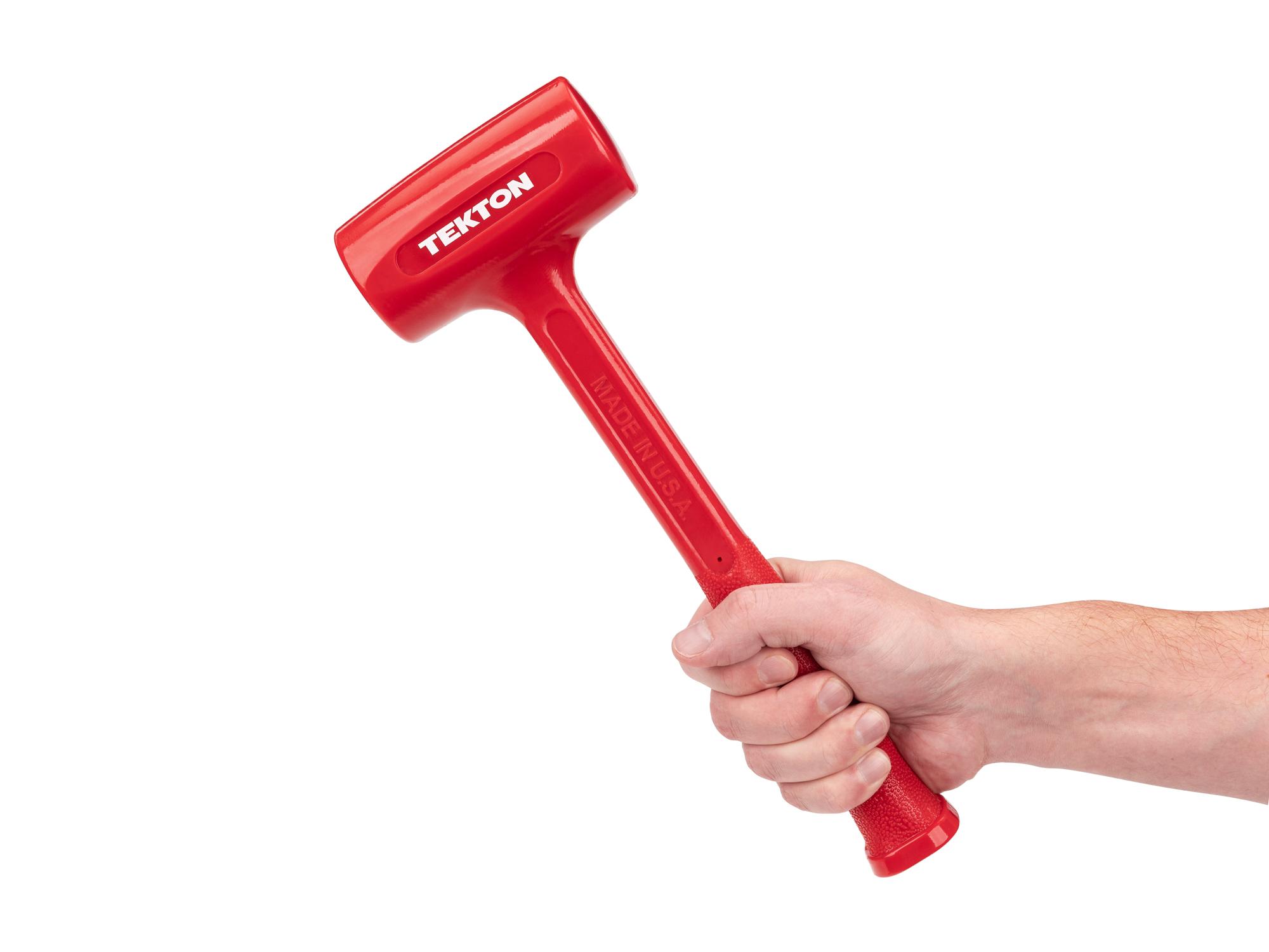 Person holding Tekton dead blow hammer. Item #HDB30026