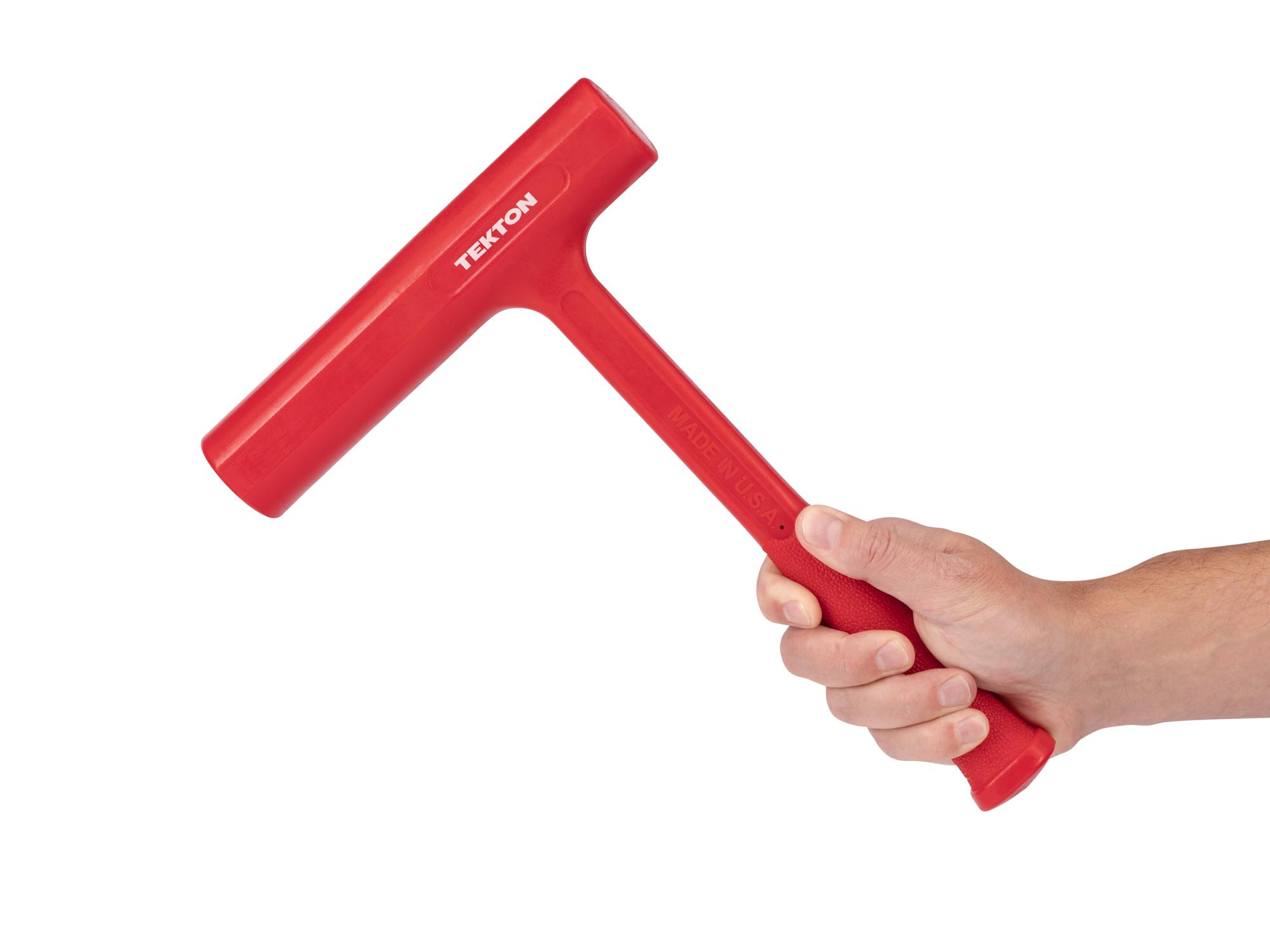 Person holding Tekton dead blow hammer. Item #HDB30032