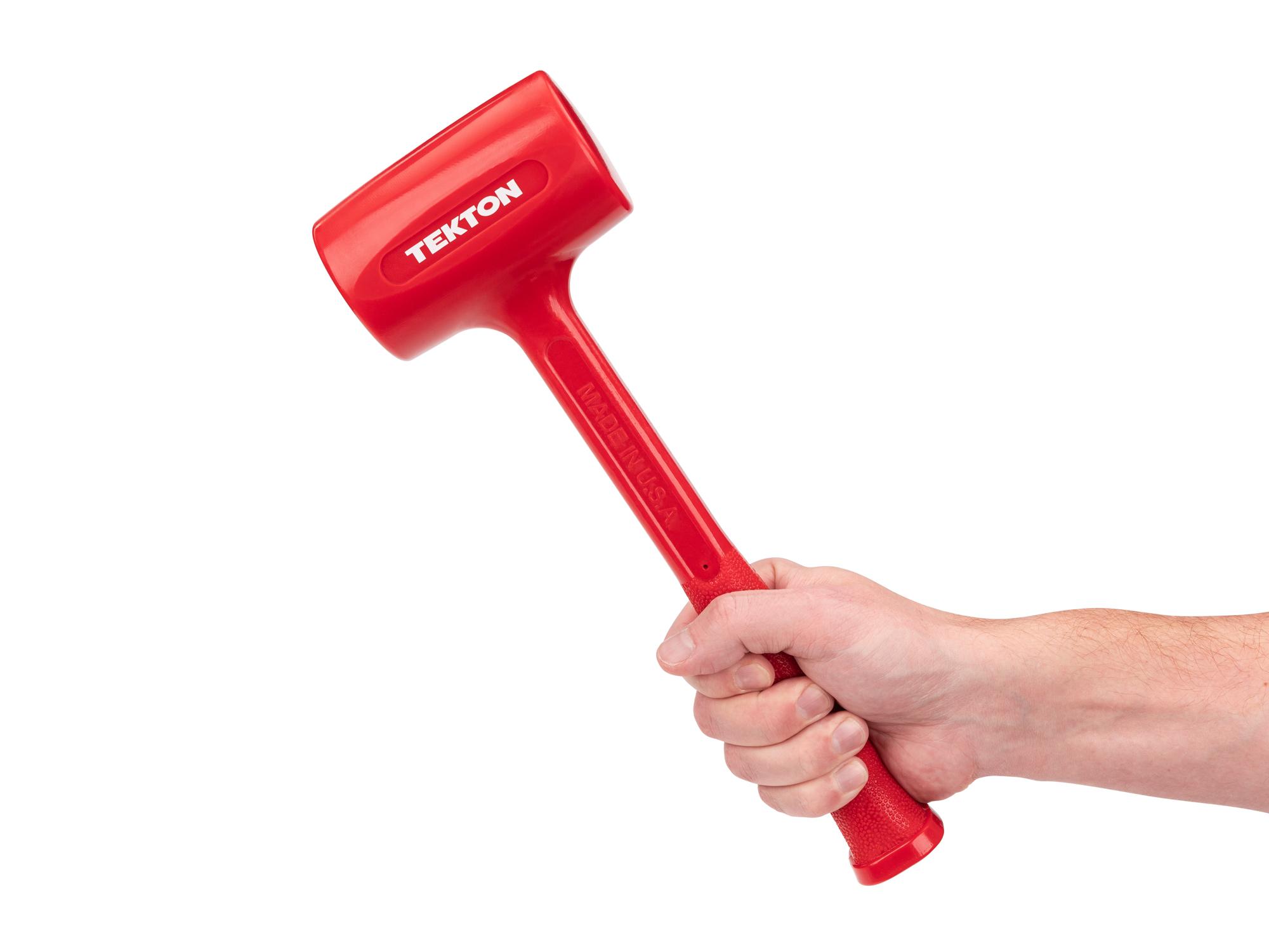 Person holding Tekton dead blow hammer. Item #HDB30039
