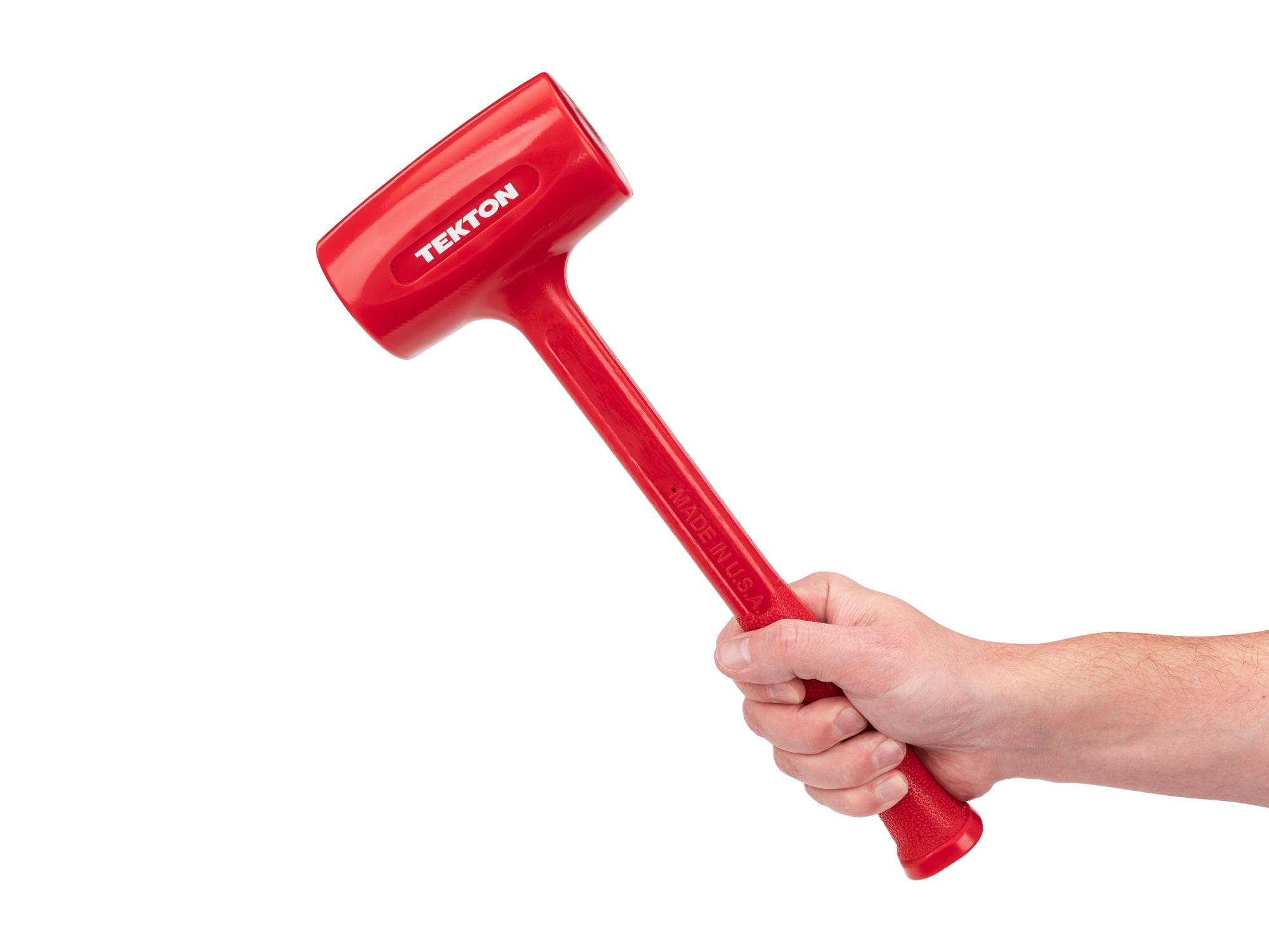 Person holding Tekton dead blow hammer. Item #HDB30045