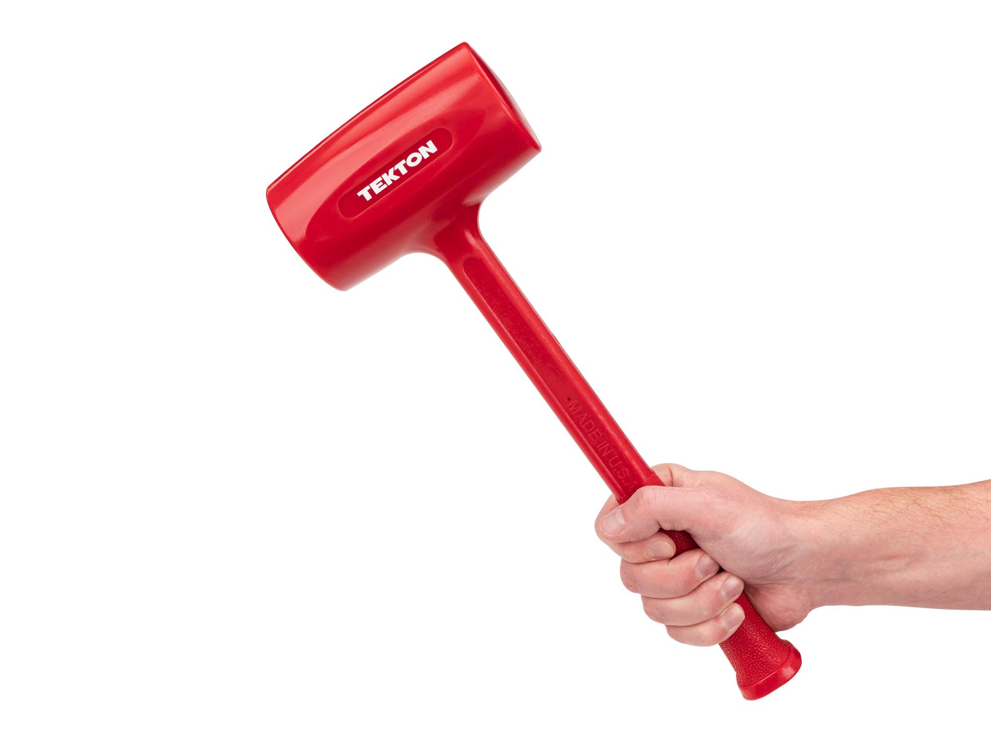Person holding Tekton dead blow hammer. Item #HDB30053