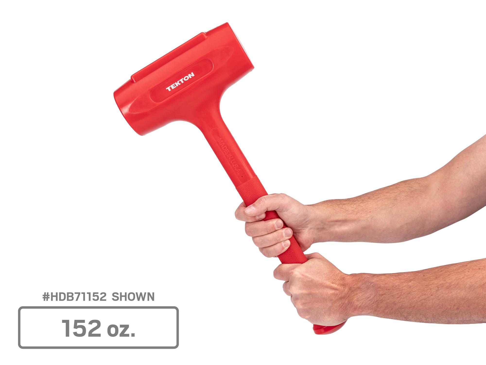 Person holding Tekton dead blow hammer set. Item #HDB97001