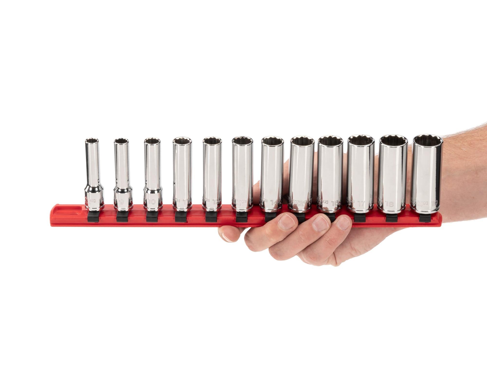 Person holding Tekton rail hand drive 12-point socket set. Item #SHD91108