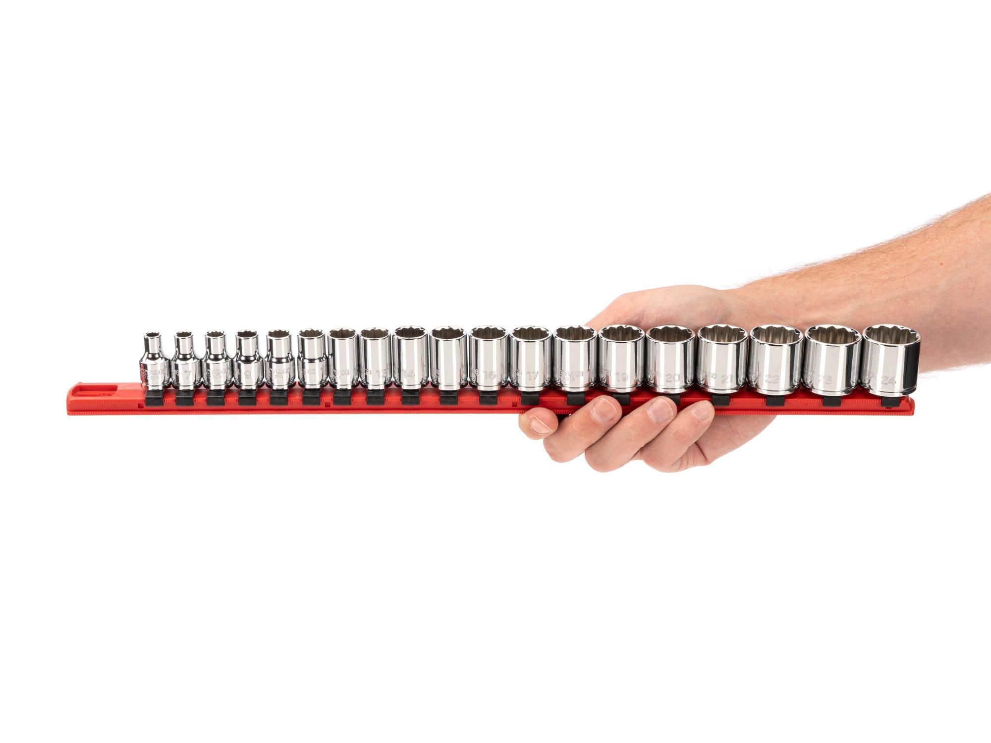 Person holding Tekton rail hand drive 12-point socket set. Item #SHD91112