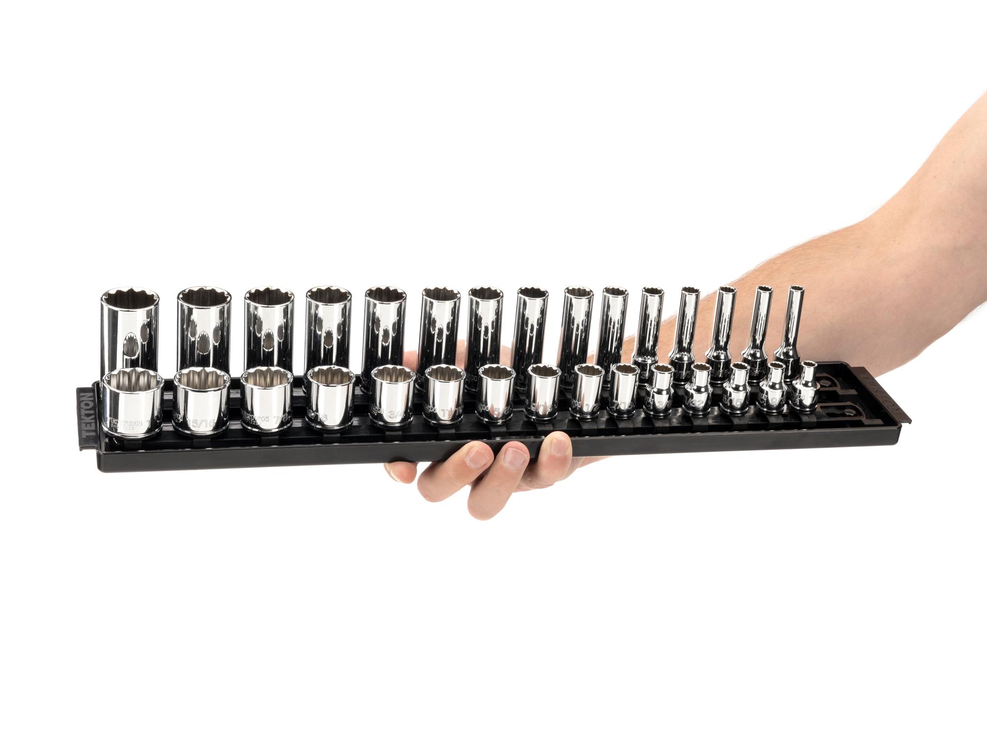Person holding Tekton rail and tray hand drive 12-point socket set. Item #SHD91210