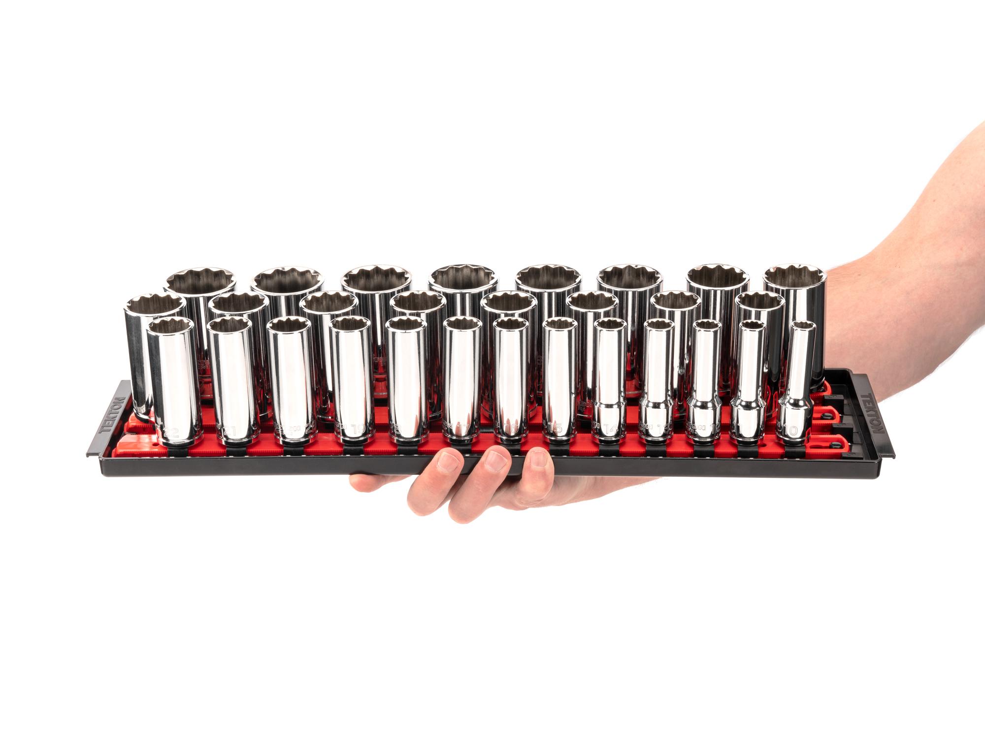 Person holding Tekton rail hand drive 12-point socket set. Item #SHD92129