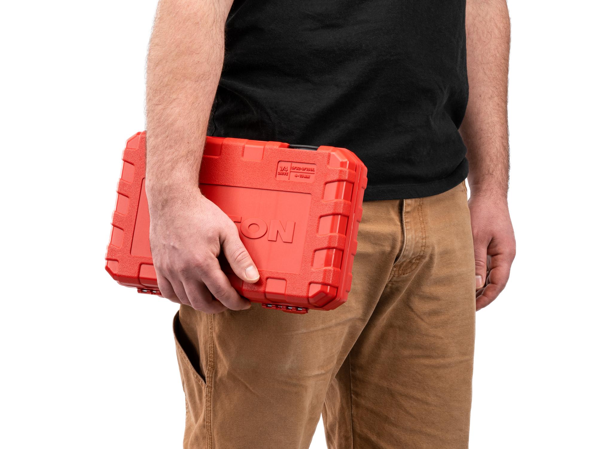 Person holding Tekton case hand drive 12-point socket set. Item #SKT05304