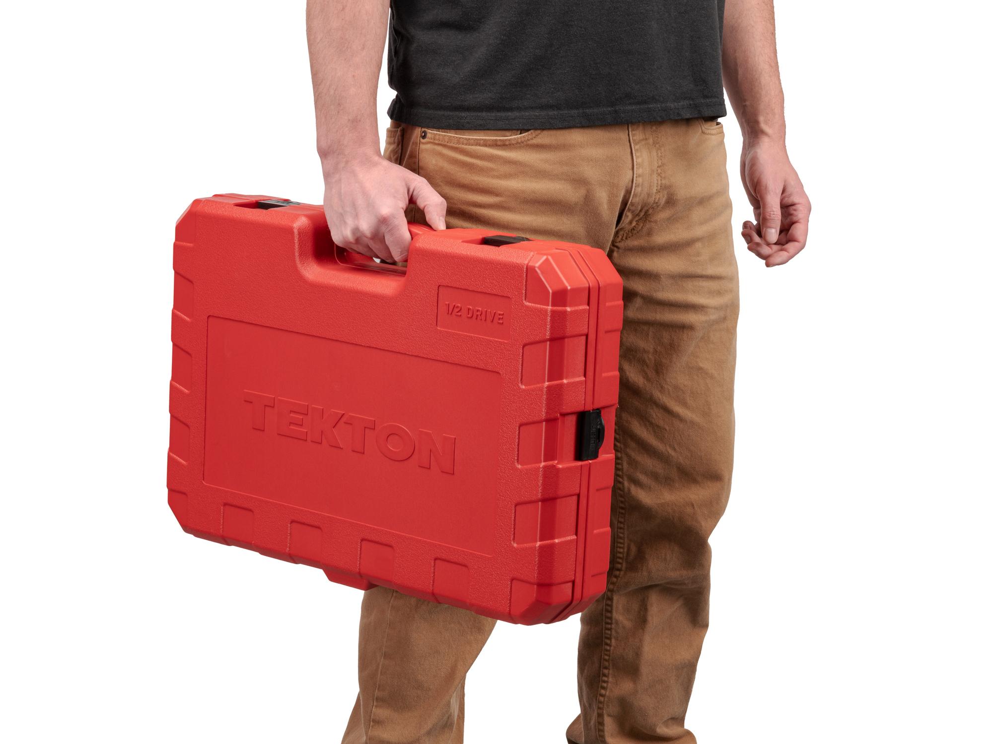 Person holding Tekton case hand drive 12-point socket set. Item #SKT25316