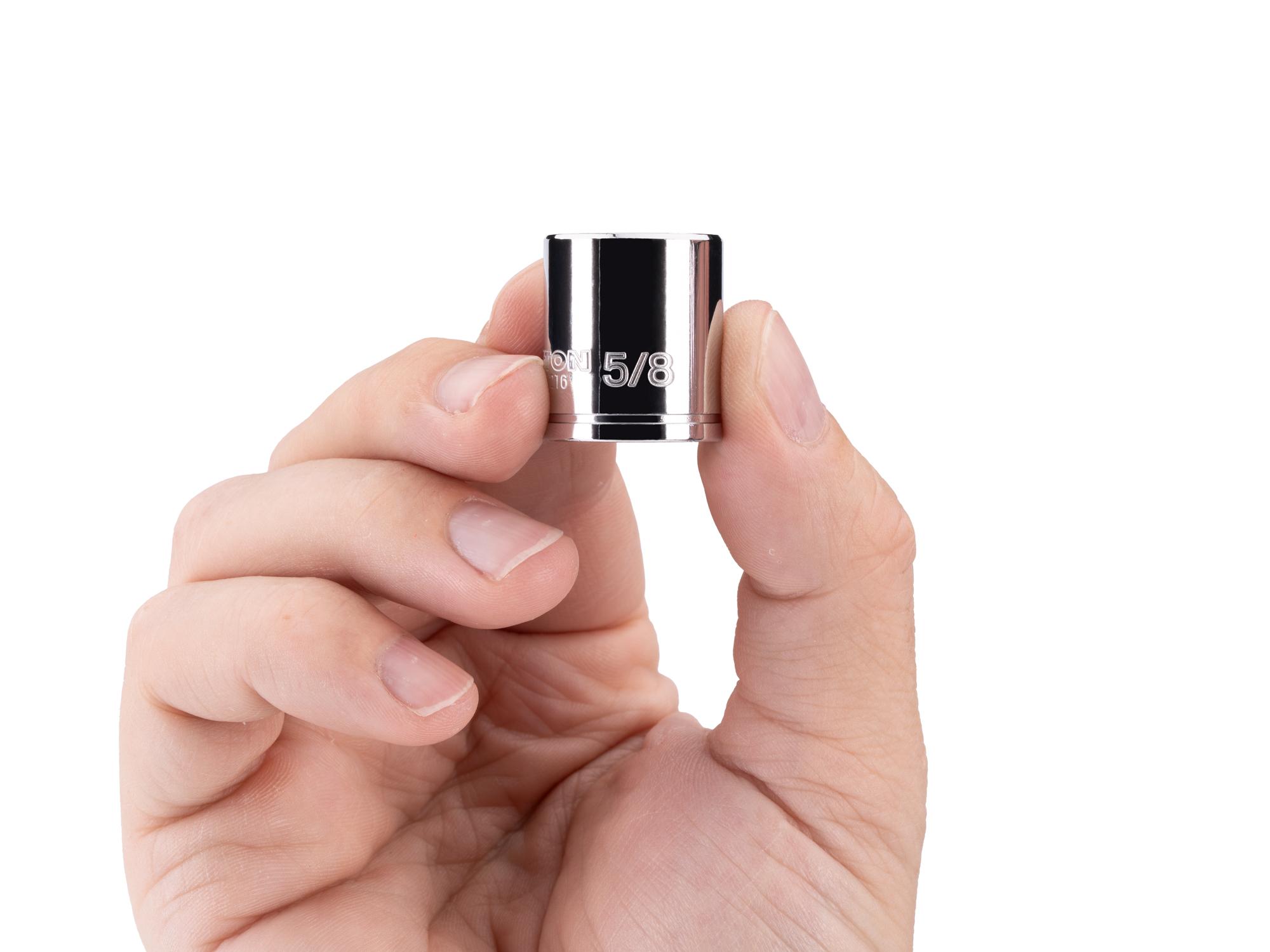 Person holding Tekton hand drive 12-point socket. Item #SHD02216