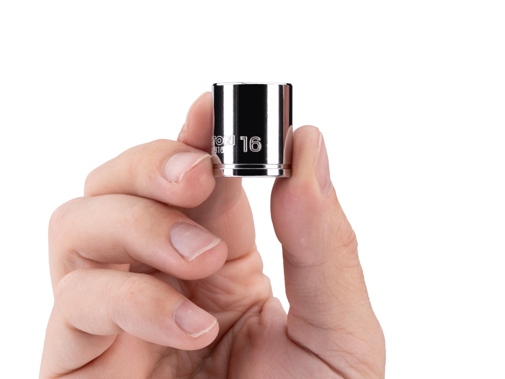 Person holding Tekton hand drive 12-point socket. Item #SHD02316