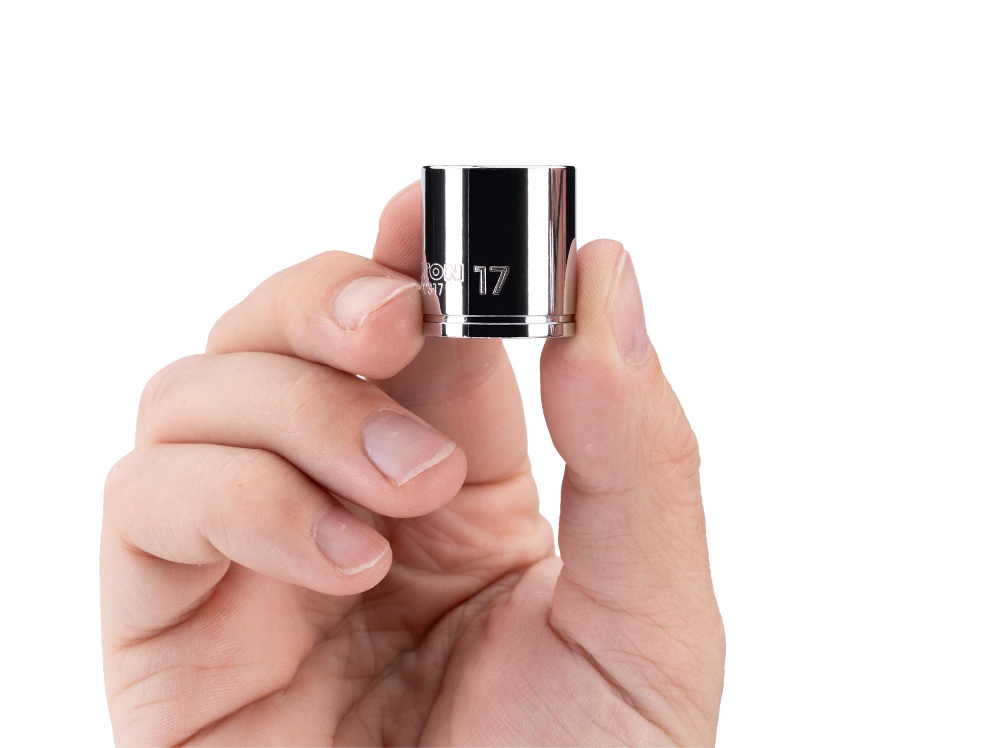 Person holding Tekton hand drive 12-point socket. Item #SHD02317