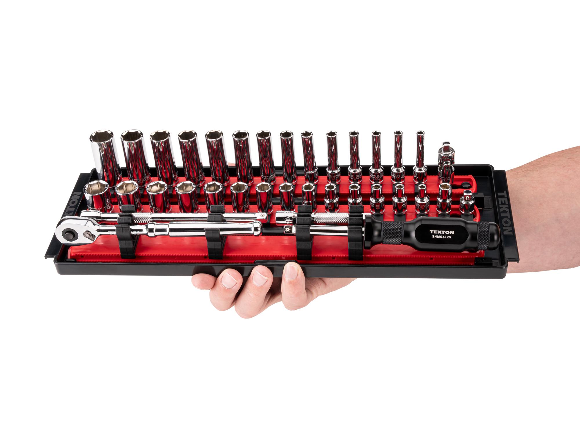 Person holding Tekton rail and tray hand drive 6-point socket set. Item #SKT03201