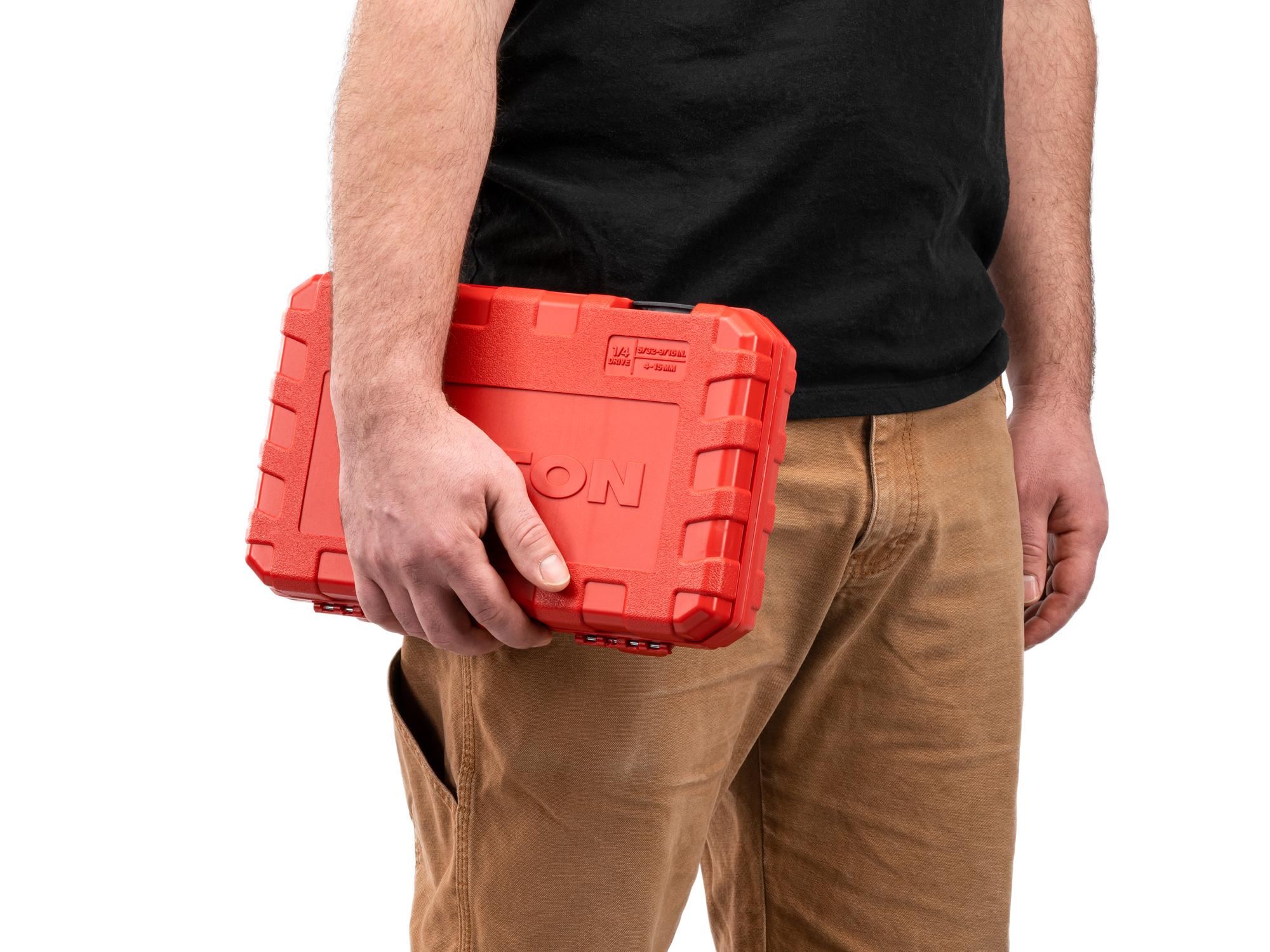 Person holding Tekton case hand drive 6-point socket set. Item #SKT05303