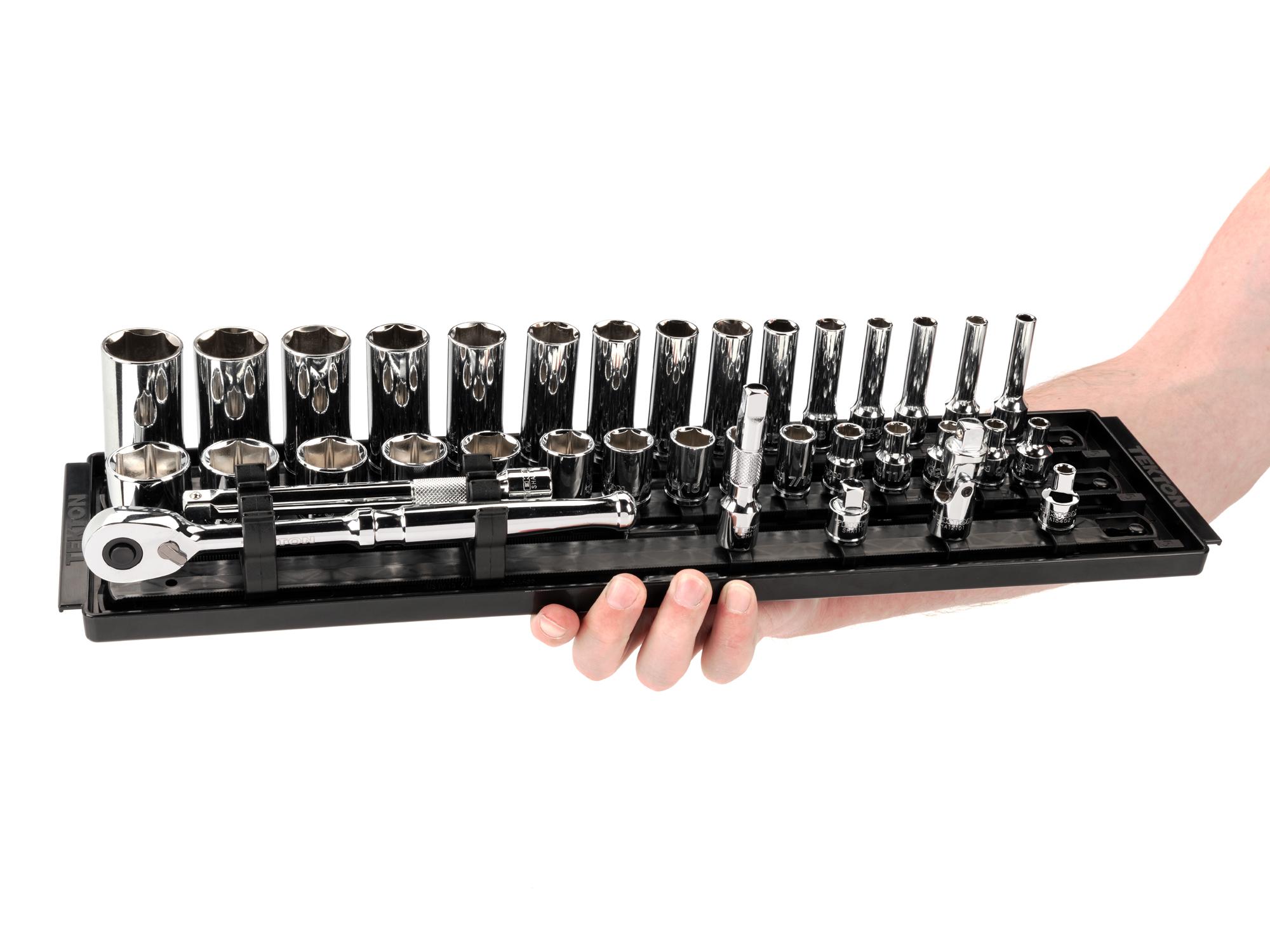 Person holding Tekton rail hand drive 6-point socket set. Item #SKT13101