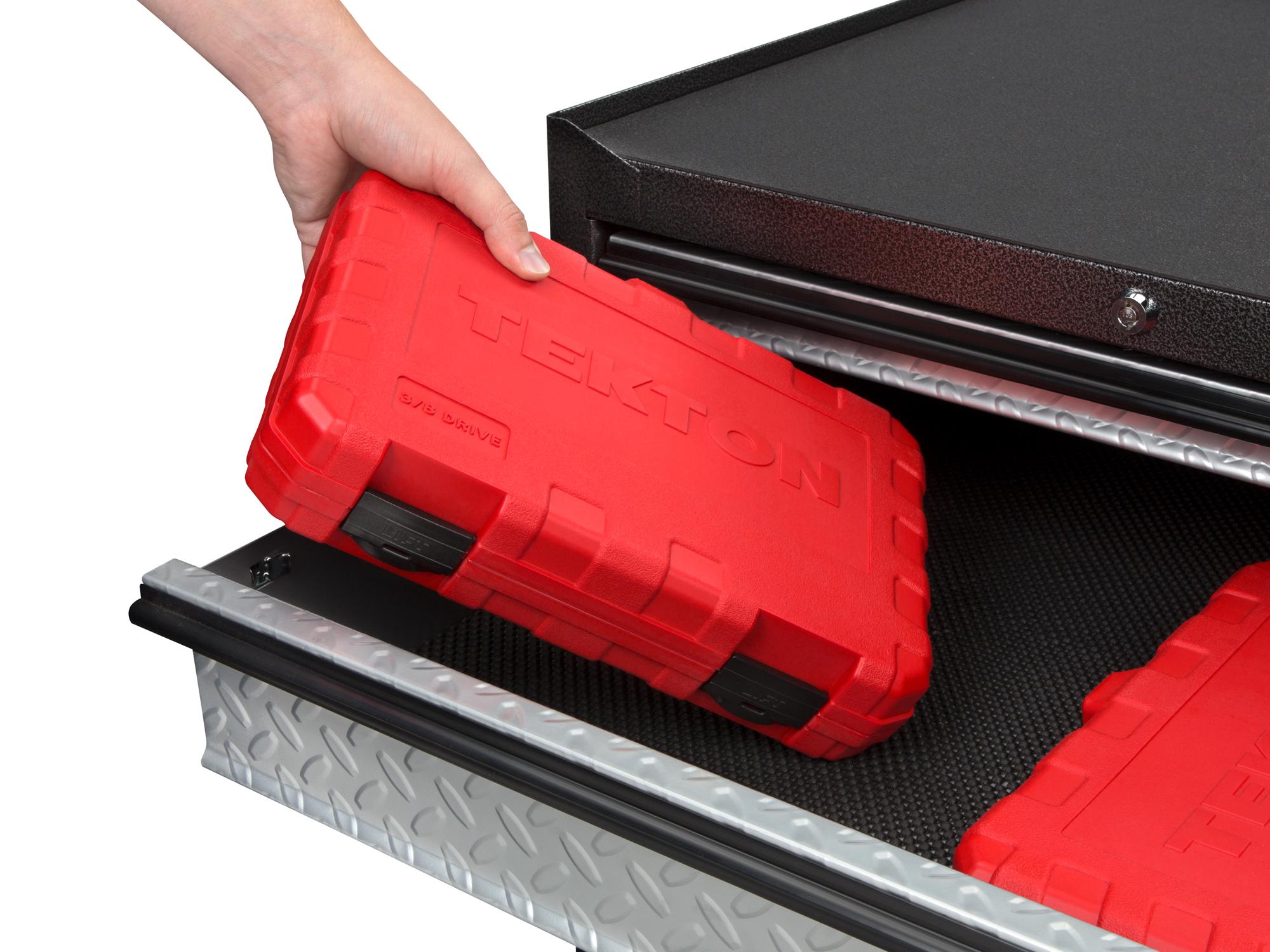 Person holding Tekton case hand drive 6-point socket set. Item #SKT15301