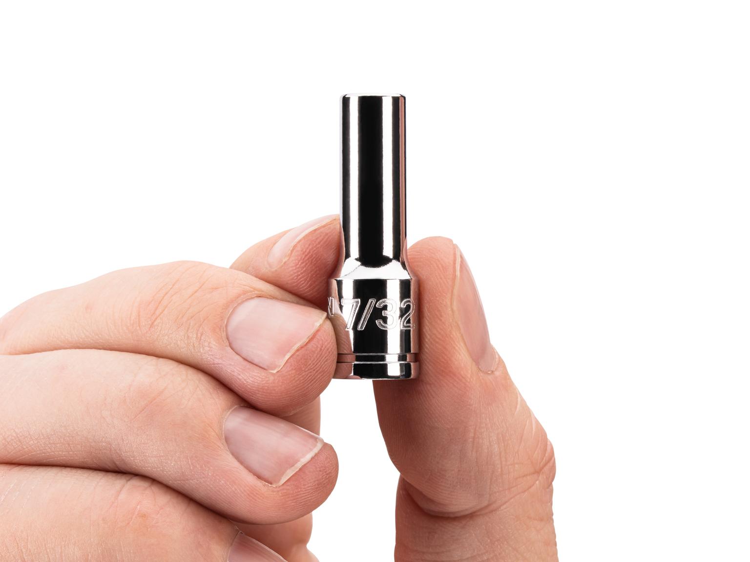 Person holding Tekton hand drive 6-point socket. Item #SHD04005