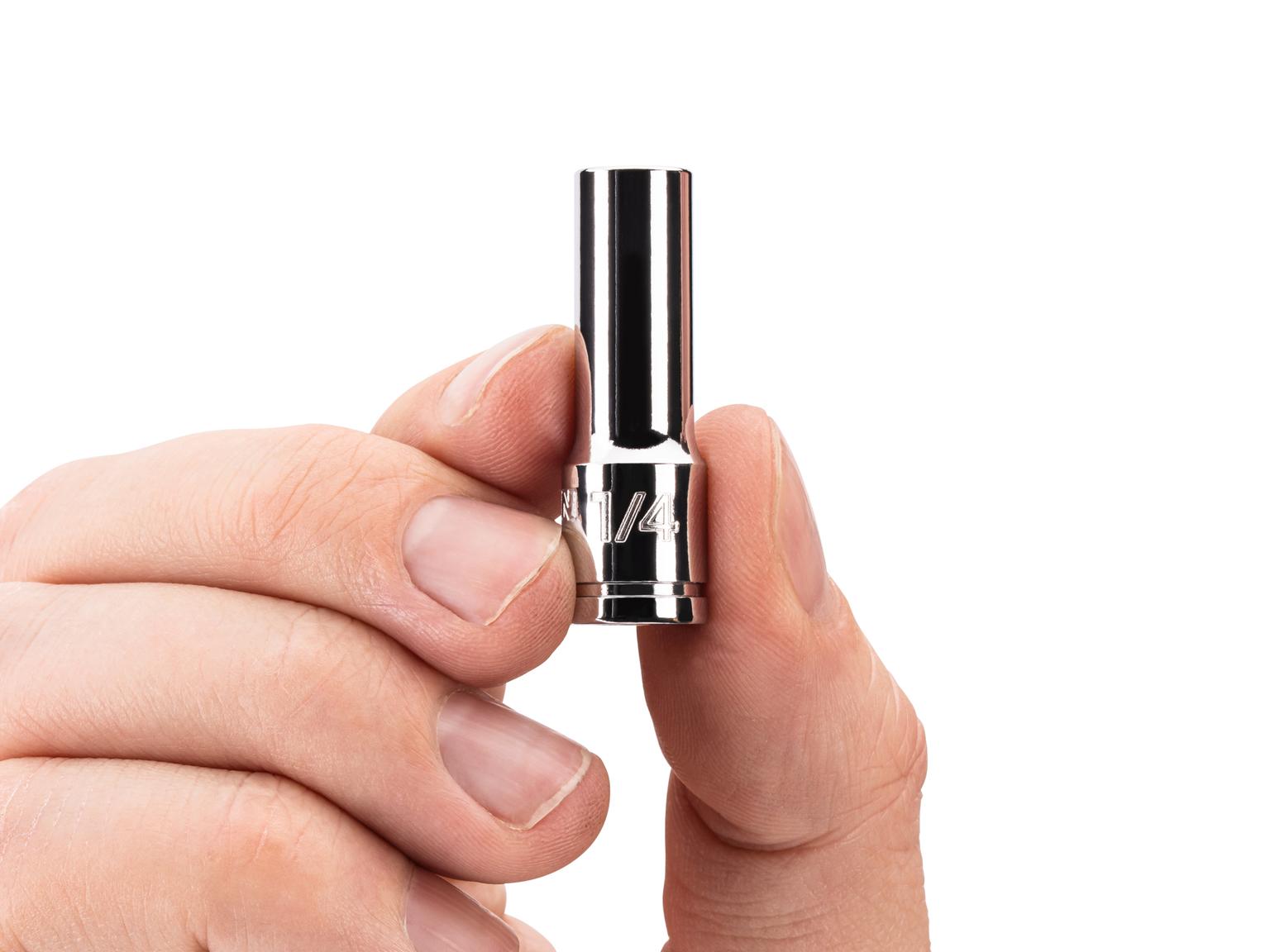 Person holding Tekton hand drive 6-point socket. Item #SHD04006