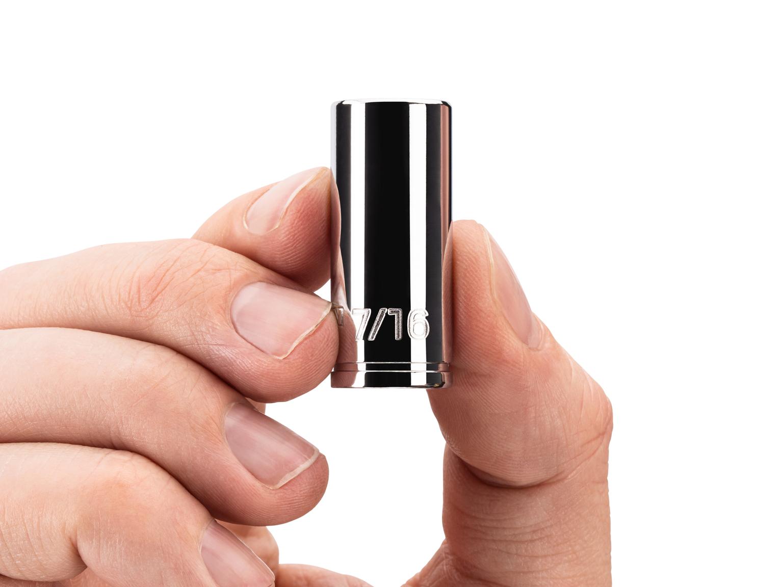 Person holding Tekton hand drive 6-point socket. Item #SHD04011