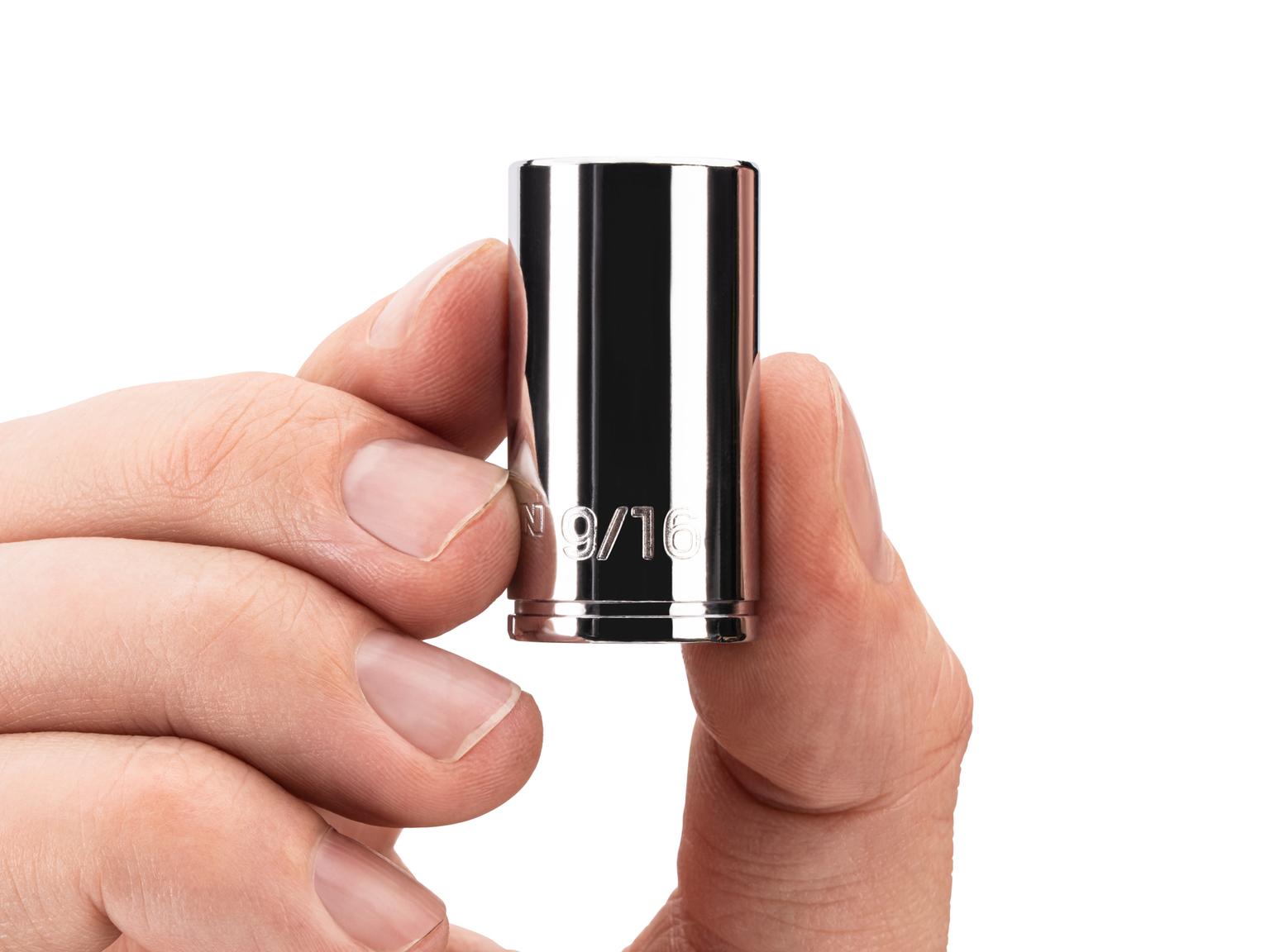 Person holding Tekton hand drive 6-point socket. Item #SHD04014