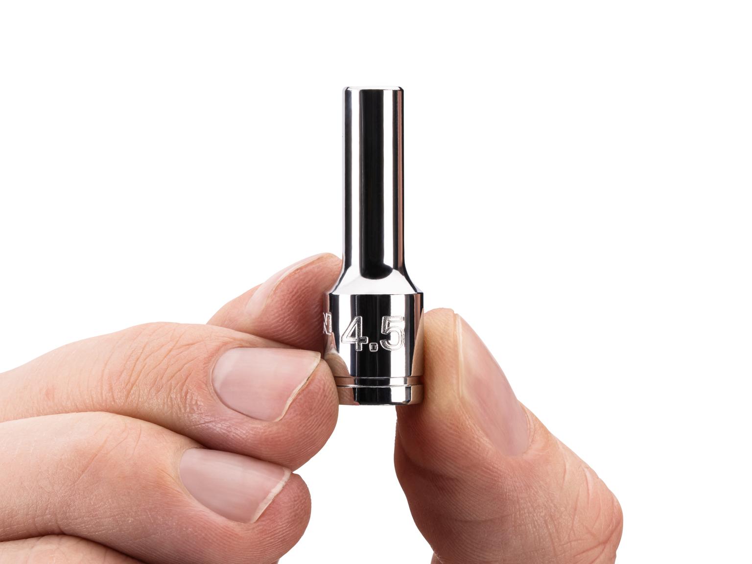 Person holding Tekton hand drive 6-point socket. Item #SHD04103