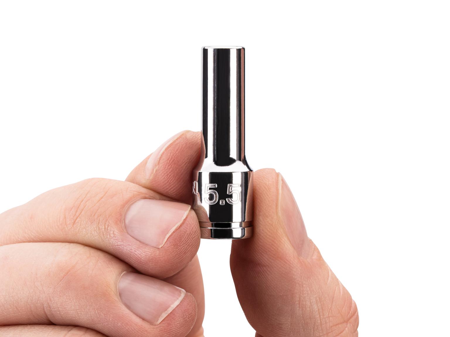 Person holding Tekton hand drive 6-point socket. Item #SHD04105