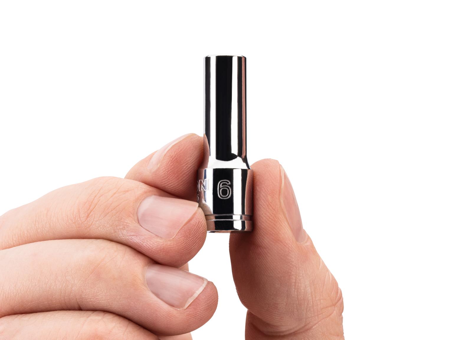 Person holding Tekton hand drive 6-point socket. Item #SHD04106