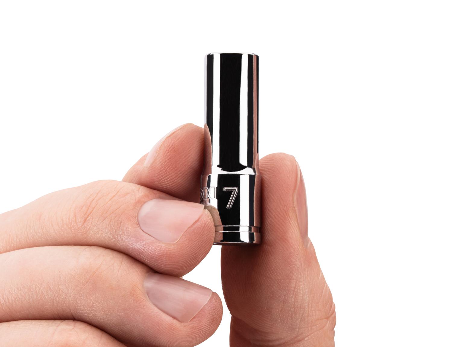 Person holding Tekton hand drive 6-point socket. Item #SHD04107