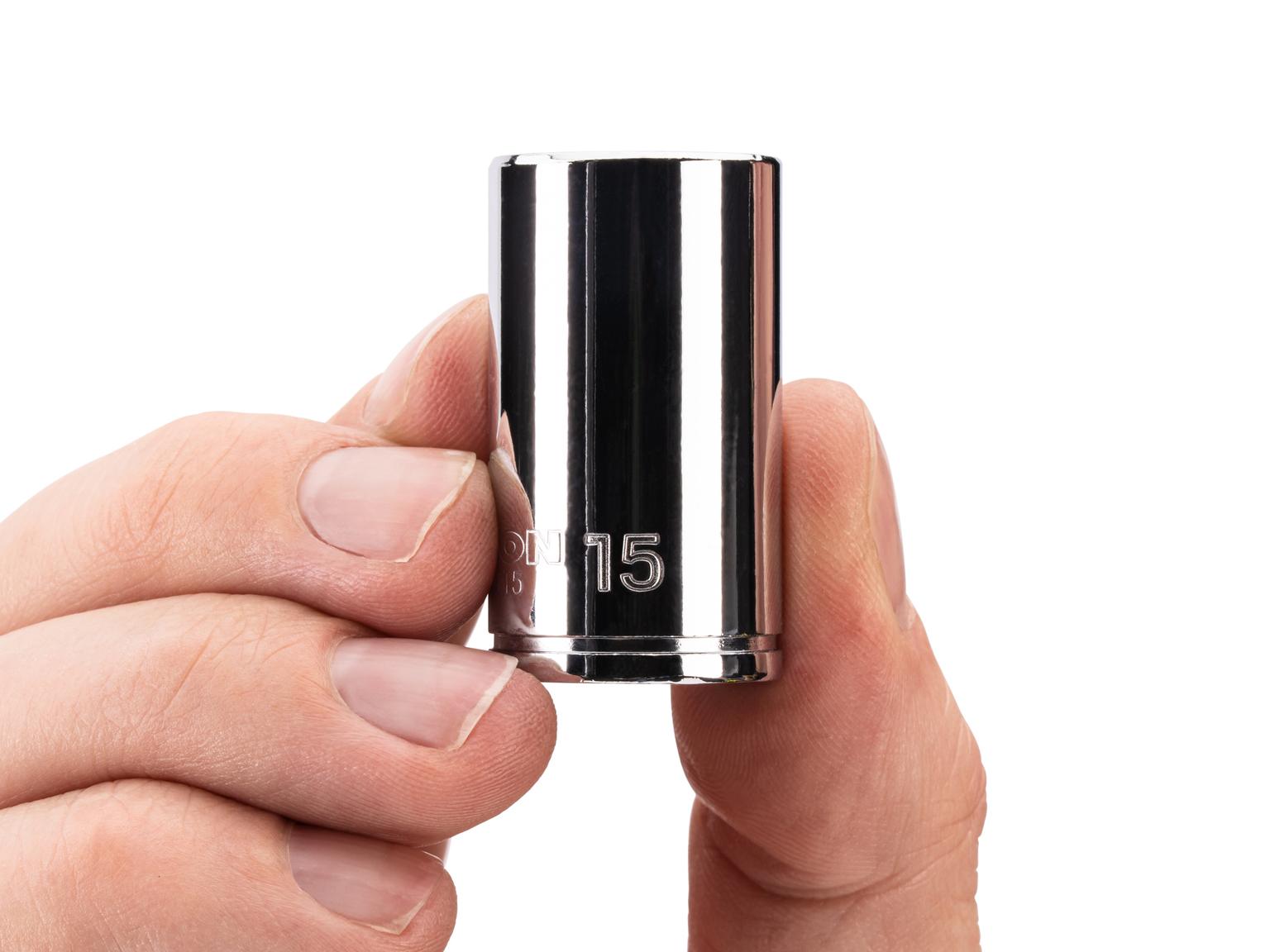 Person holding Tekton hand drive 6-point socket. Item #SHD04115