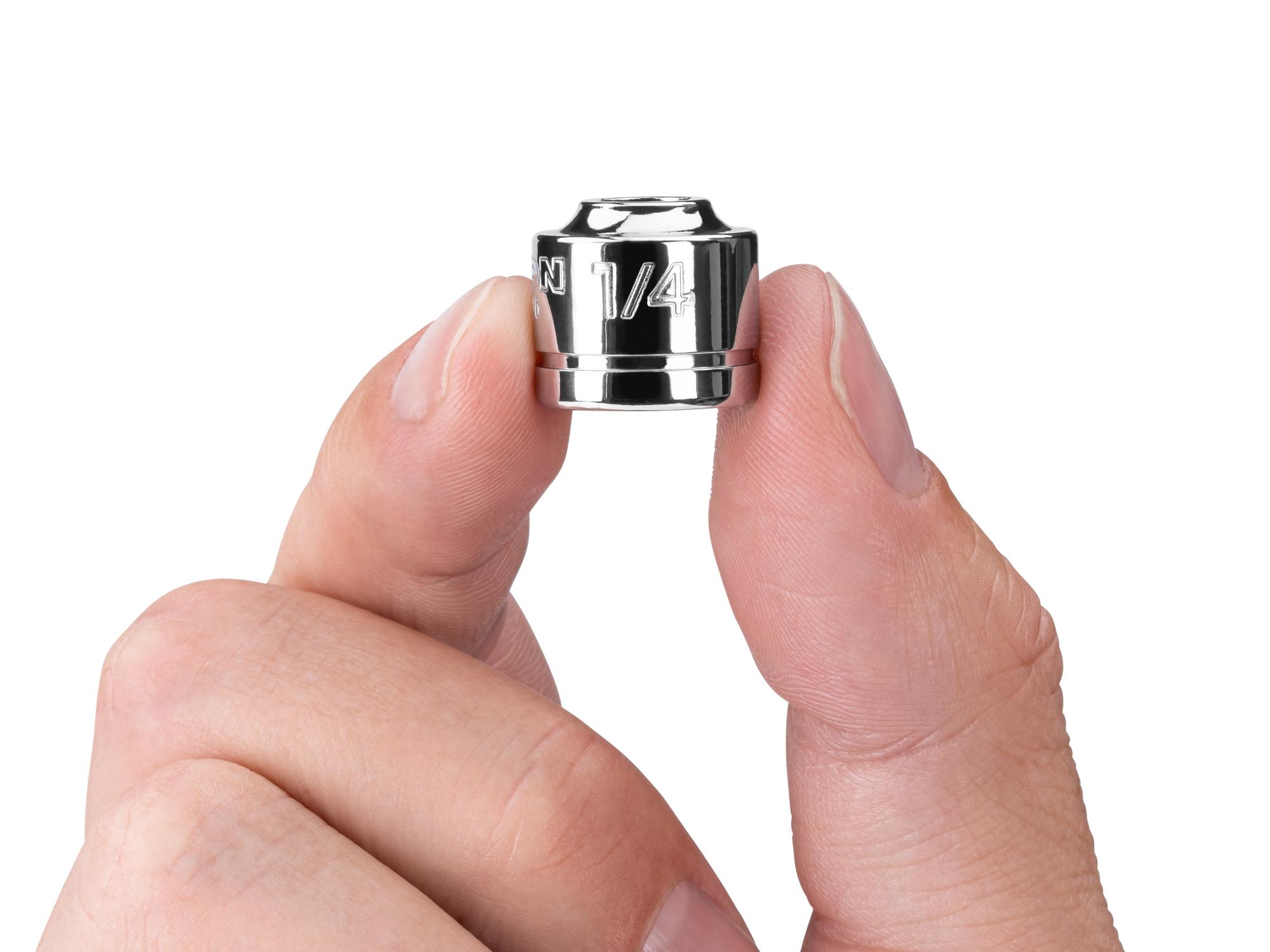 Person holding Tekton hand drive 6-point socket. Item #SHD11006