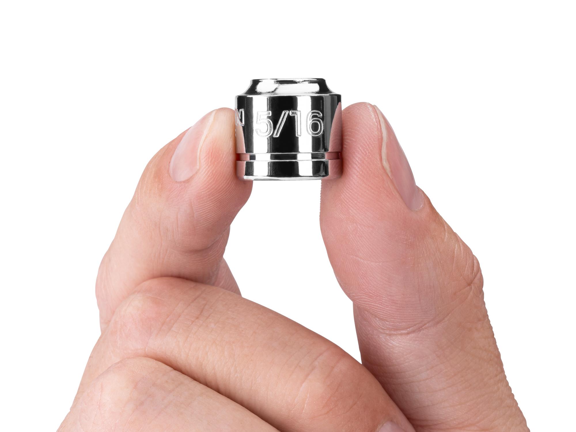 Person holding Tekton hand drive 6-point socket. Item #SHD11008