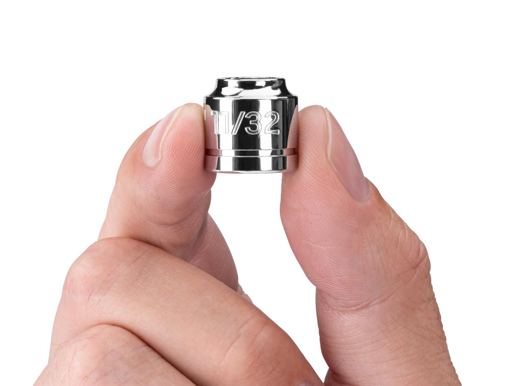 Person holding Tekton hand drive 6-point socket. Item #SHD11009