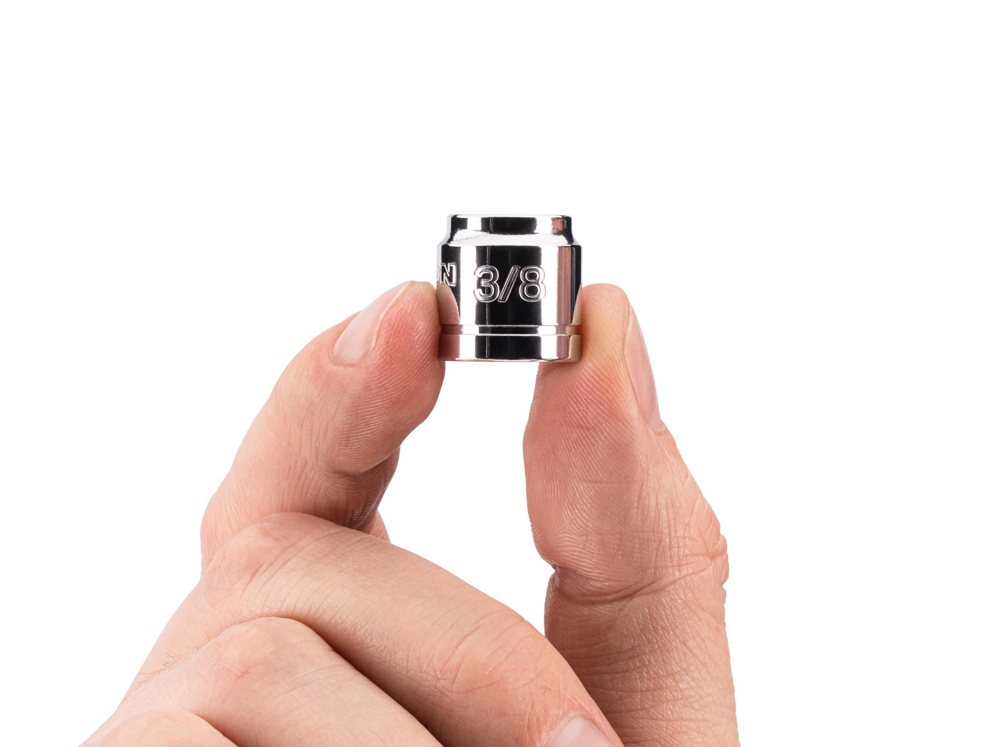 Person holding Tekton hand drive 6-point socket. Item #SHD11010