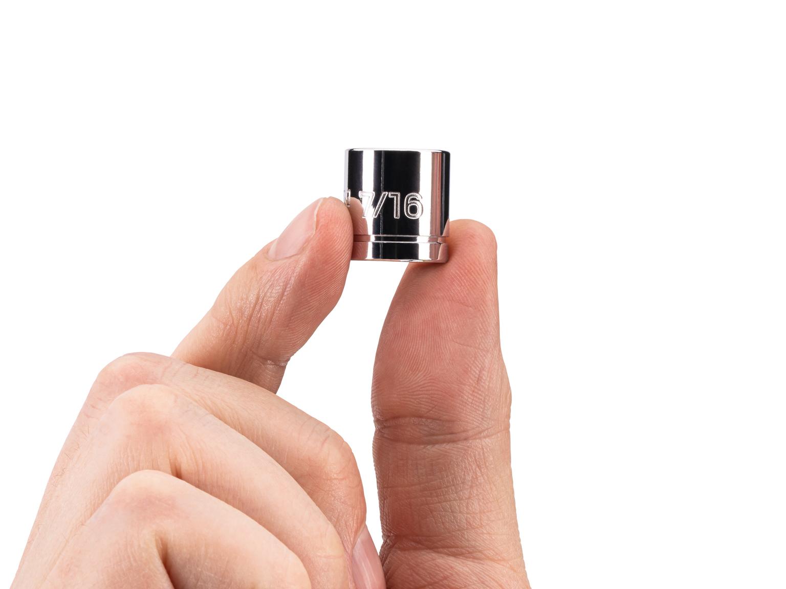 Person holding Tekton hand drive 6-point socket. Item #SHD11011