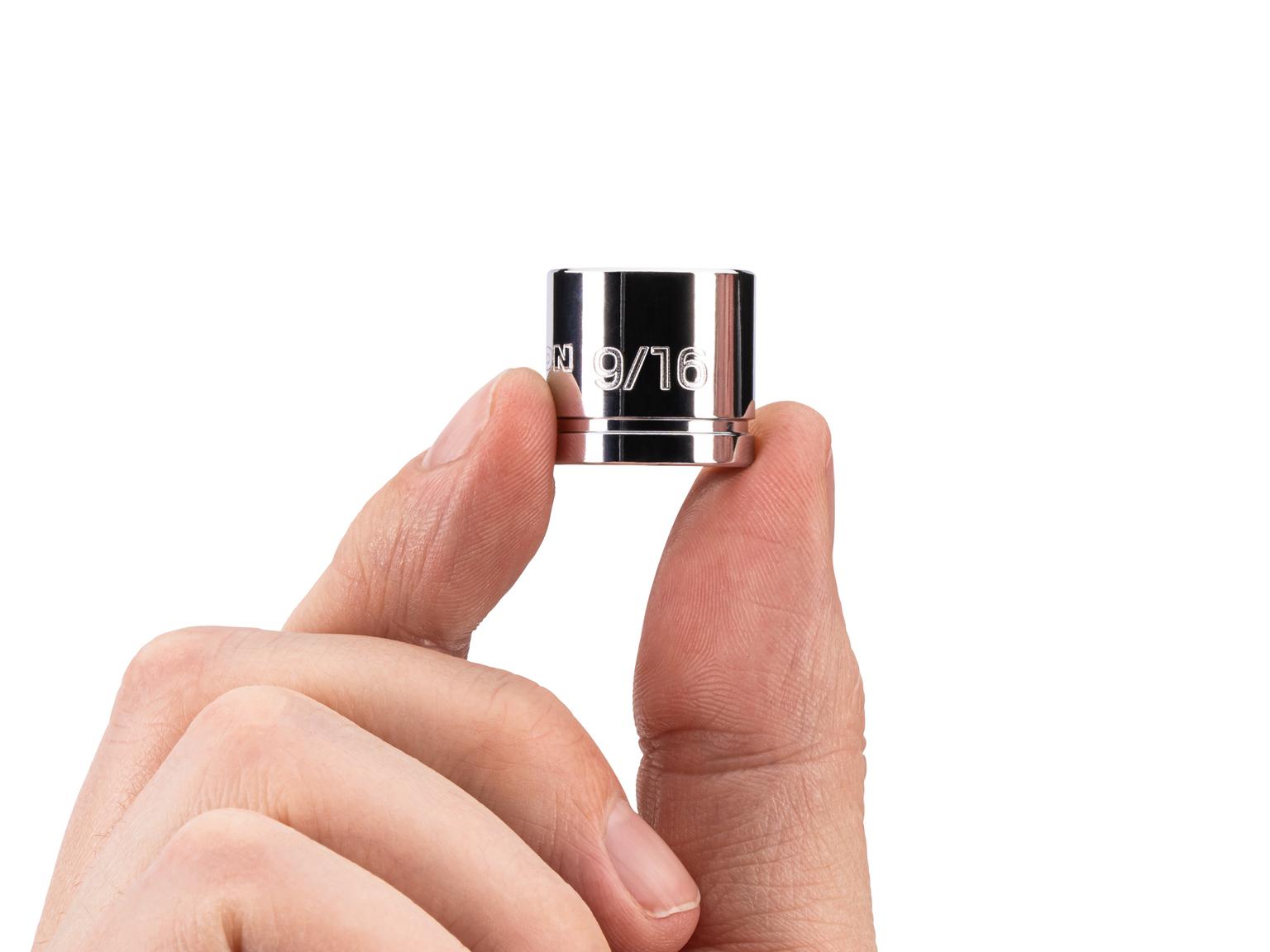 Person holding Tekton hand drive 6-point socket. Item #SHD11014