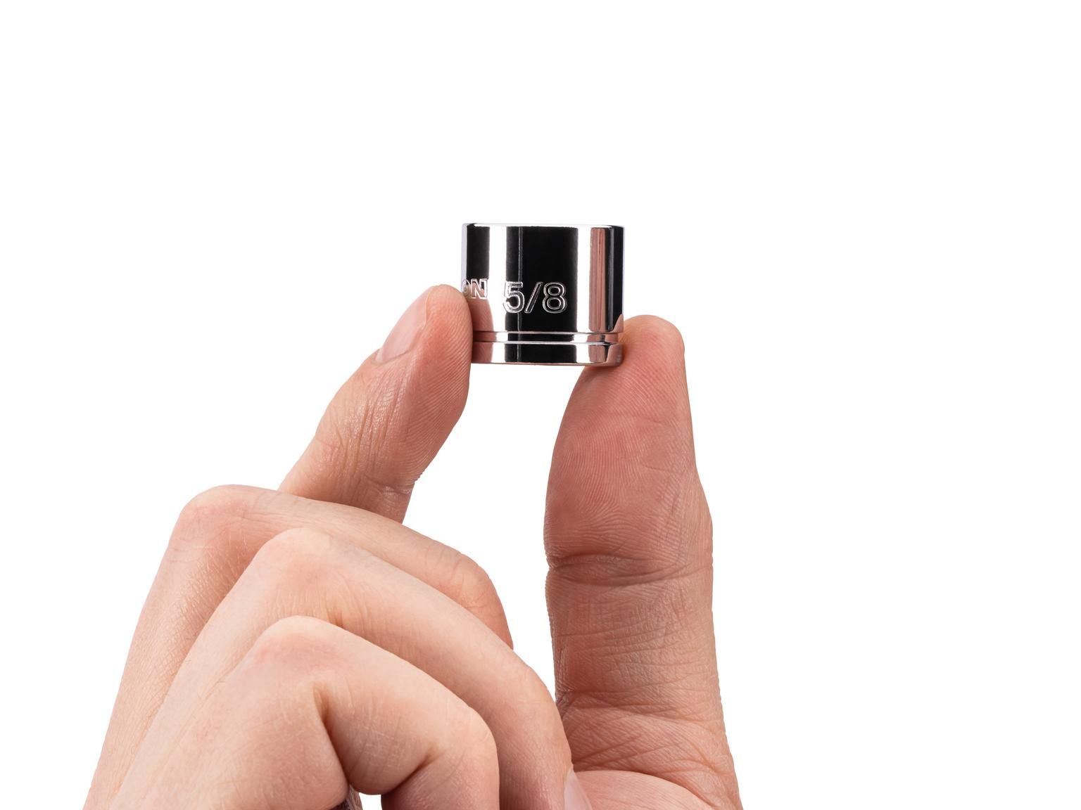 Person holding Tekton hand drive 6-point socket. Item #SHD11016