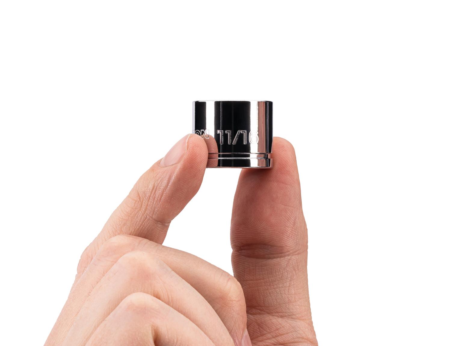 Person holding Tekton hand drive 6-point socket. Item #SHD11017