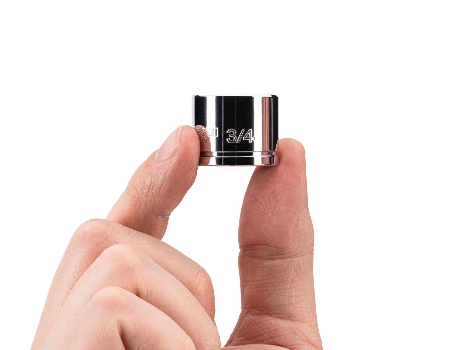 Person holding Tekton hand drive 6-point socket. Item #SHD11019