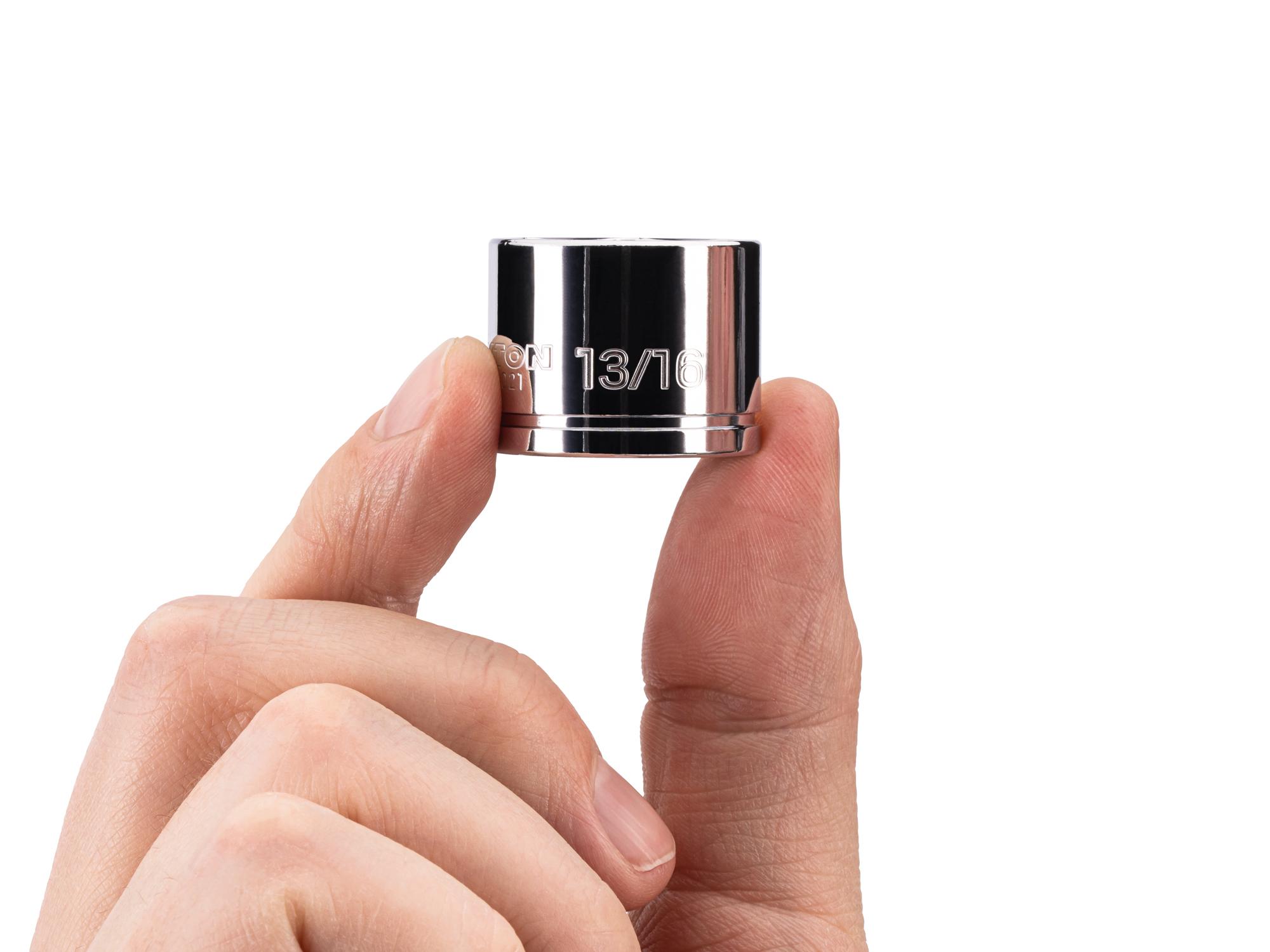 Person holding Tekton hand drive 6-point socket. Item #SHD11021