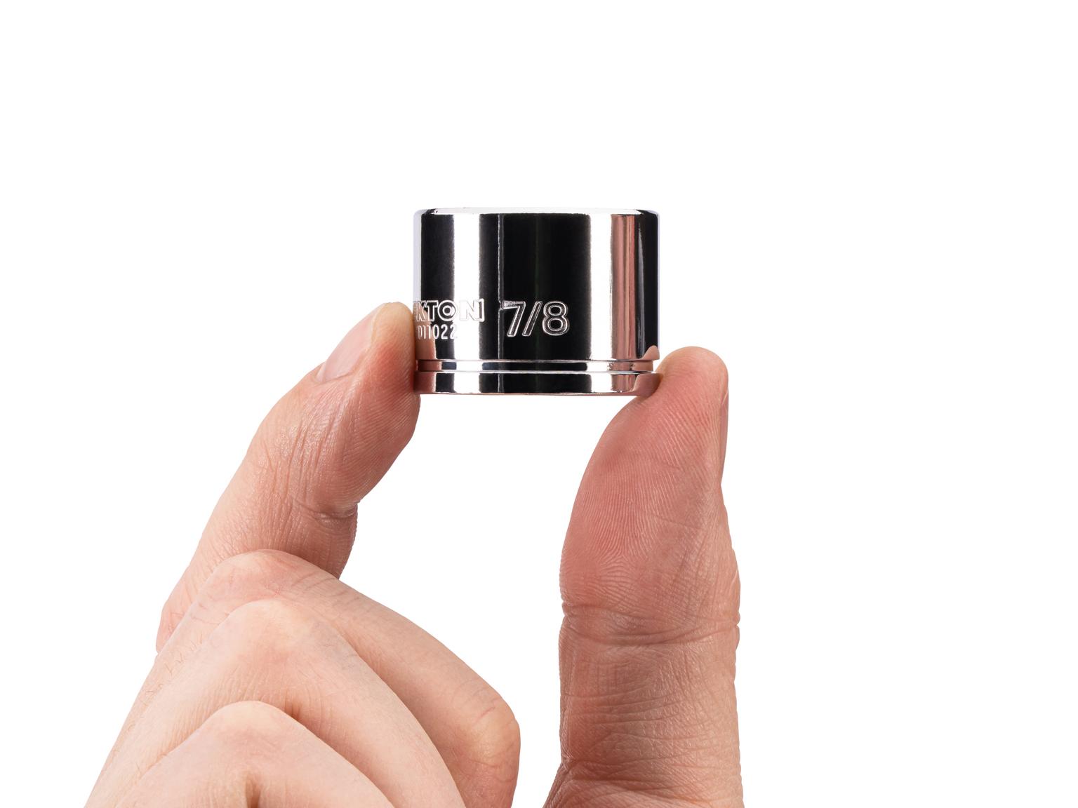 Person holding Tekton hand drive 6-point socket. Item #SHD11022