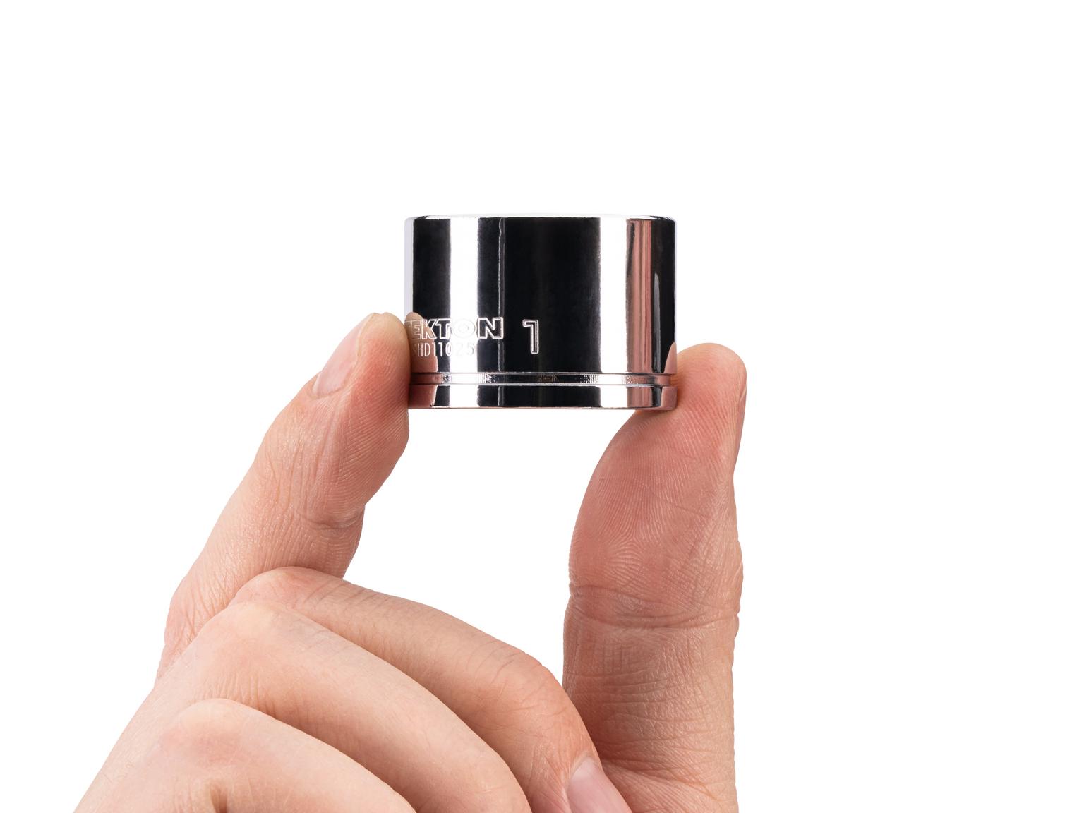 Person holding Tekton hand drive 6-point socket. Item #SHD11025