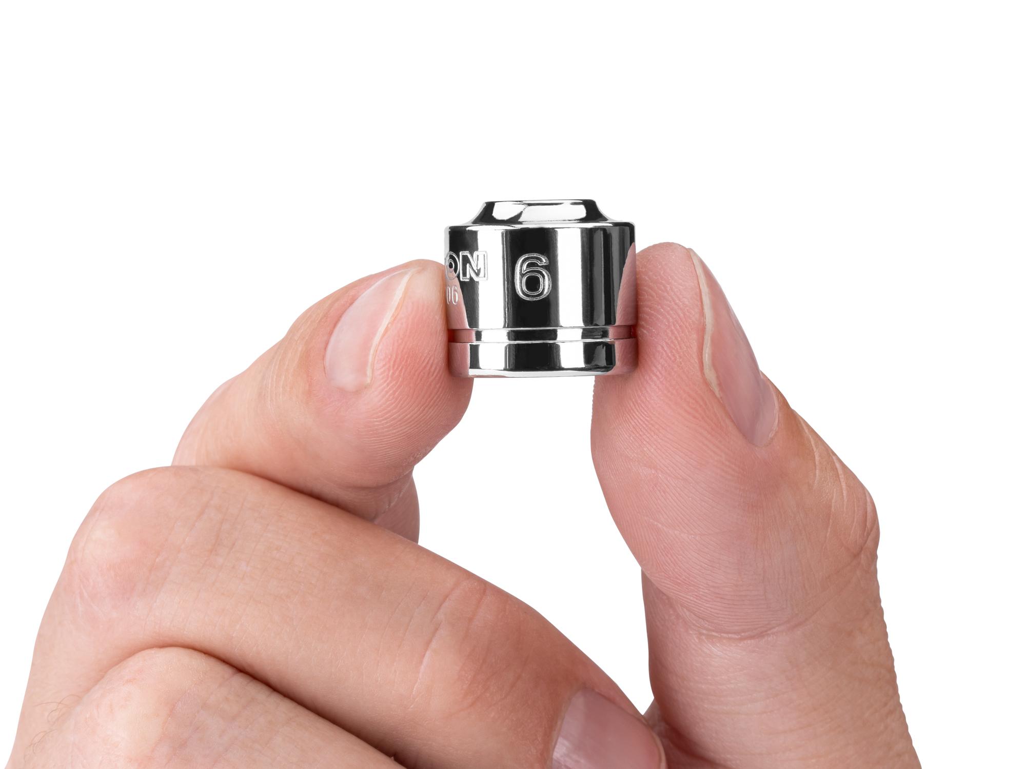 Person holding Tekton hand drive 6-point socket. Item #SHD11106