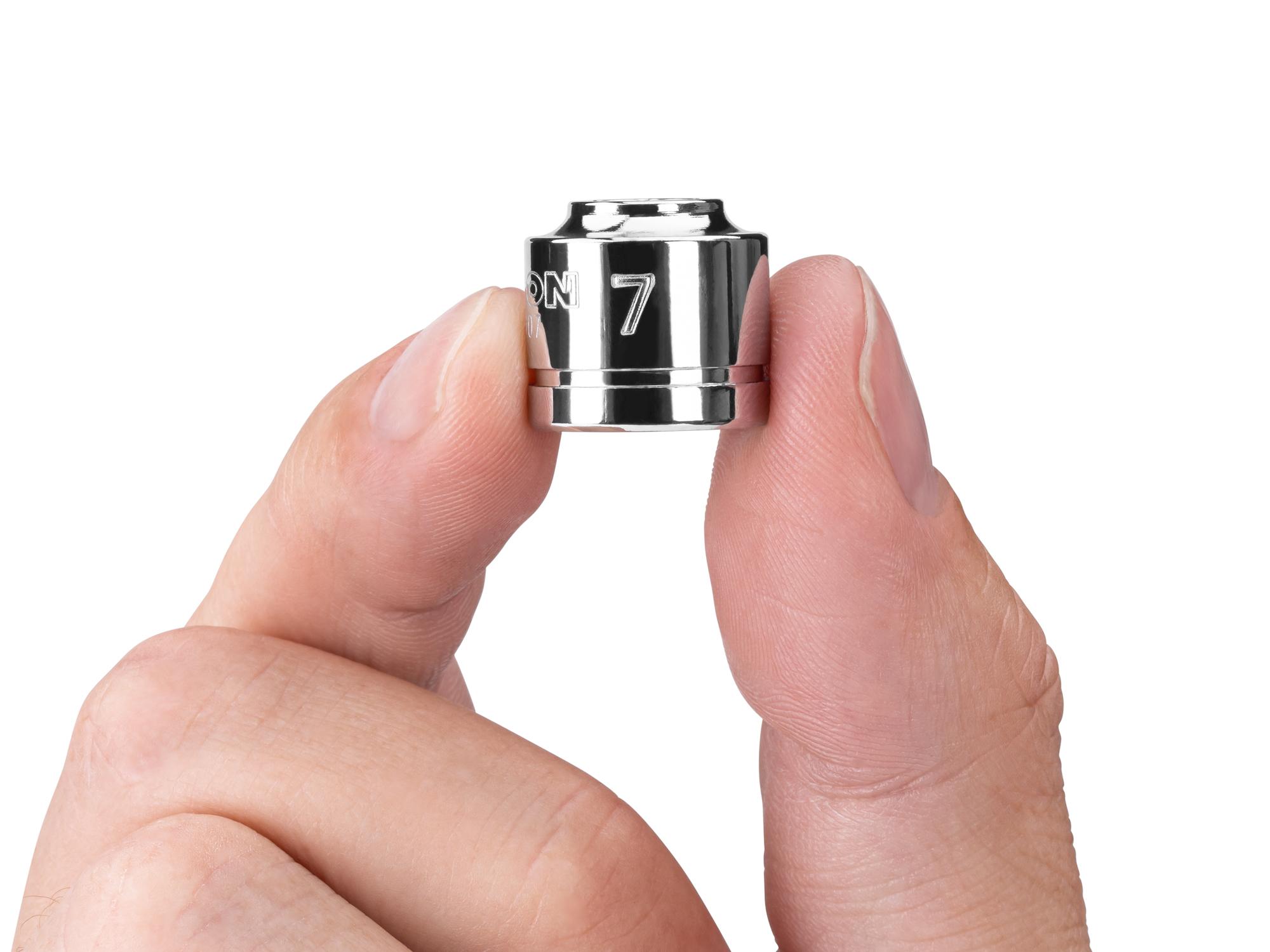 Person holding Tekton hand drive 6-point socket. Item #SHD11107