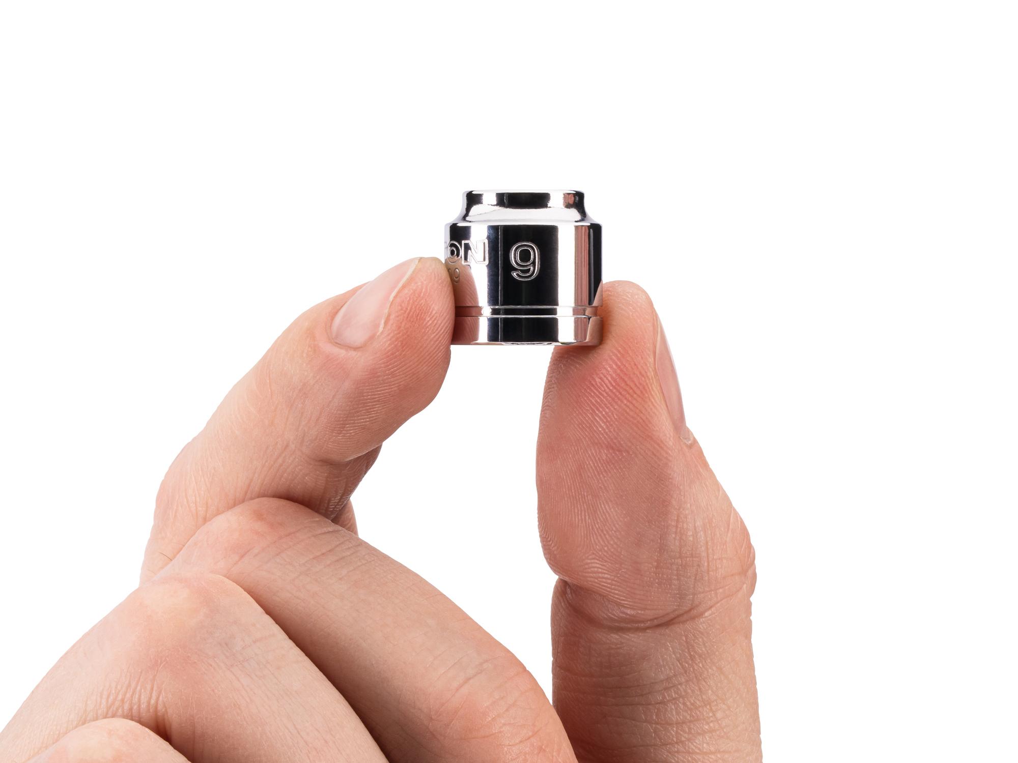 Person holding Tekton hand drive 6-point socket. Item #SHD11109