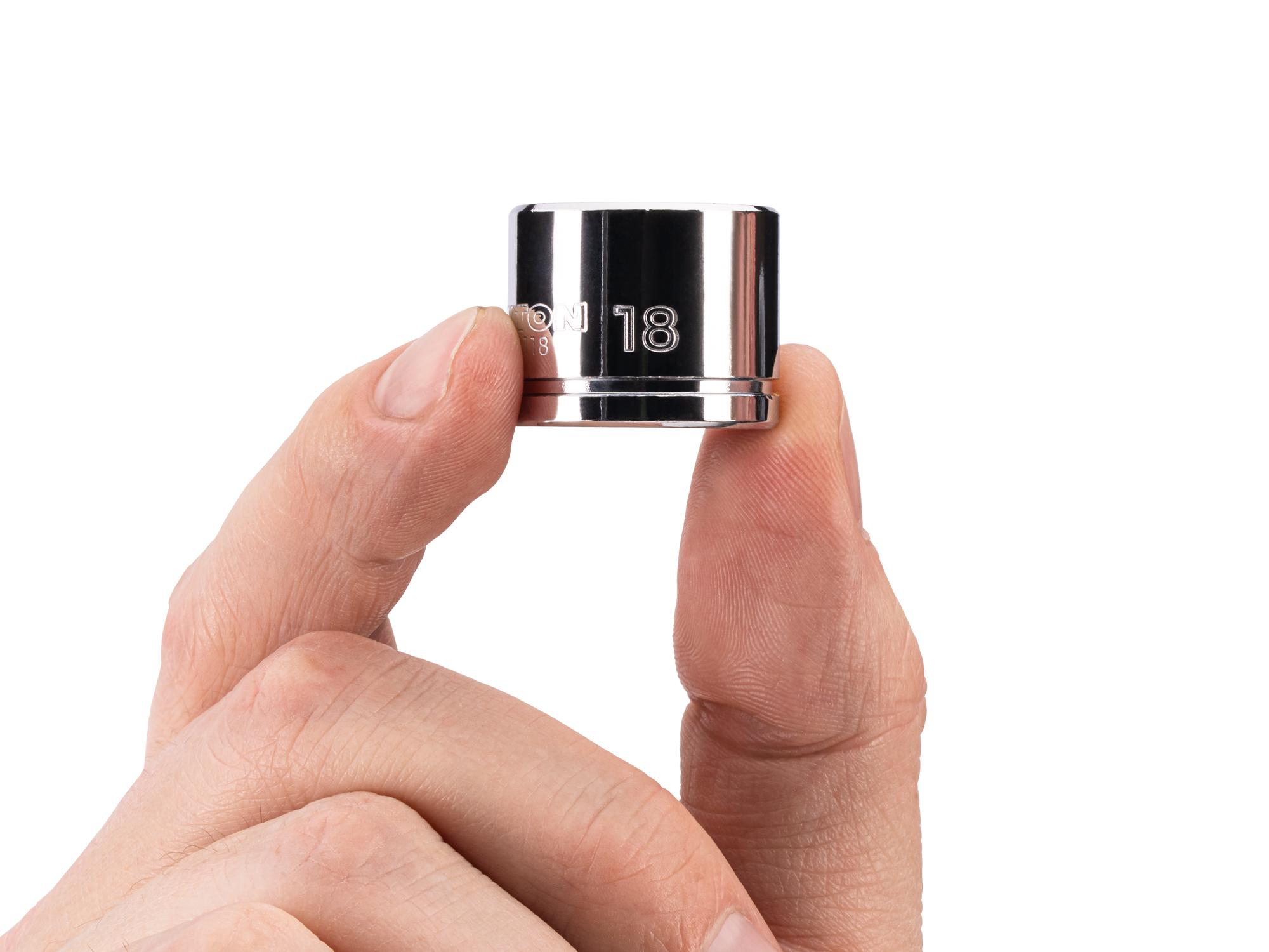 Person holding Tekton hand drive 6-point socket. Item #SHD11118