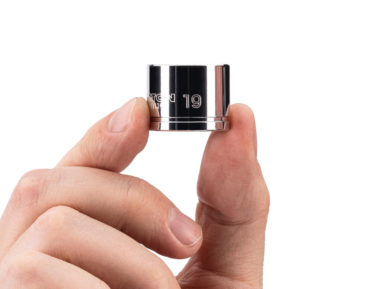 Person holding Tekton hand drive 6-point socket. Item #SHD11119