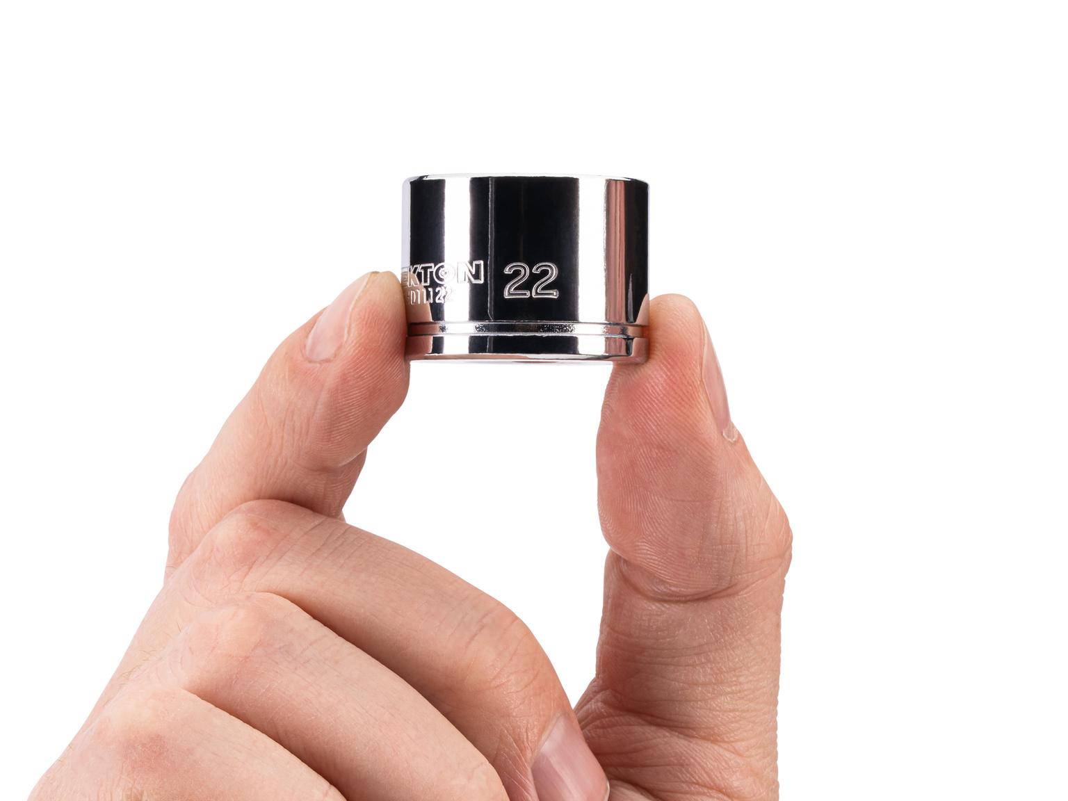 Person holding Tekton hand drive 6-point socket. Item #SHD11122