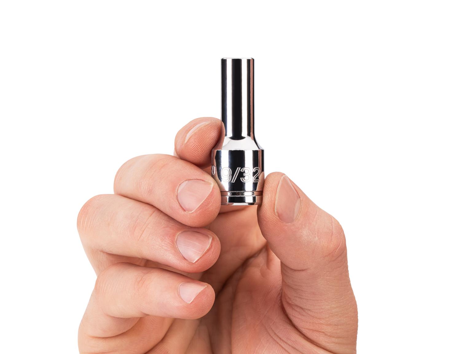 Person holding Tekton 9/32 inch hand drive 6-point socket. Item #SHD14007