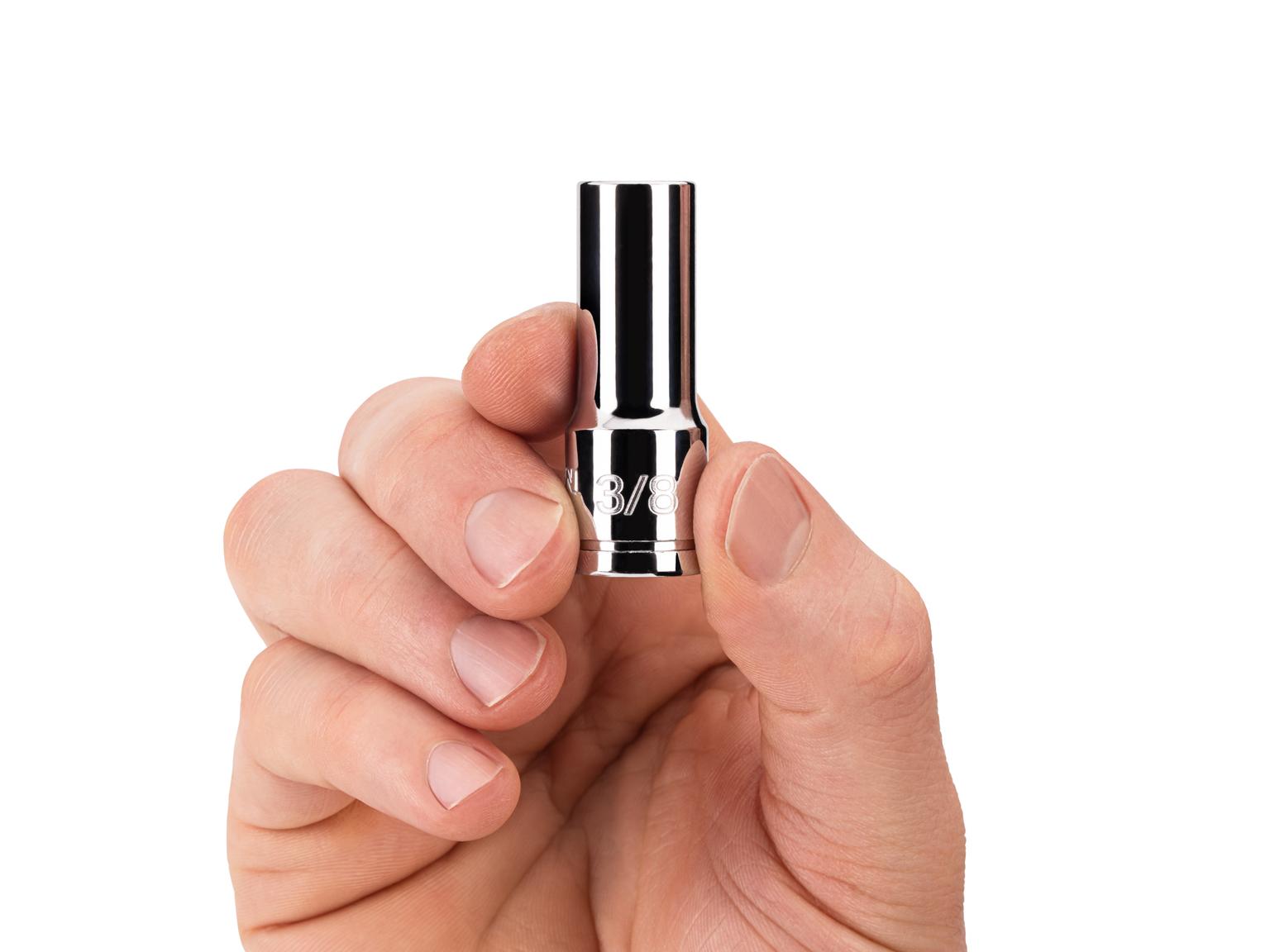 Person holding Tekton 3/8 inch hand drive 6-point socket. Item #SHD14010