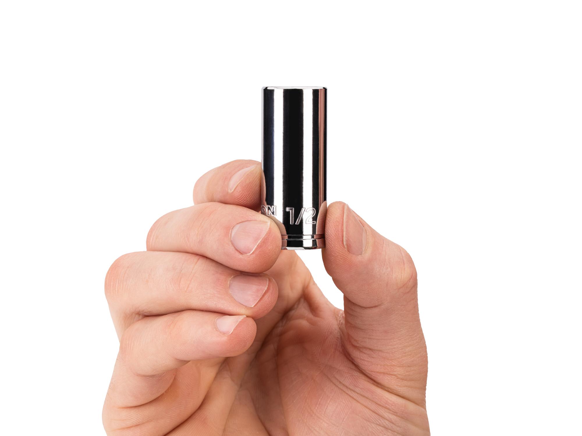 Person holding Tekton hand drive 6-point socket. Item #SHD14013